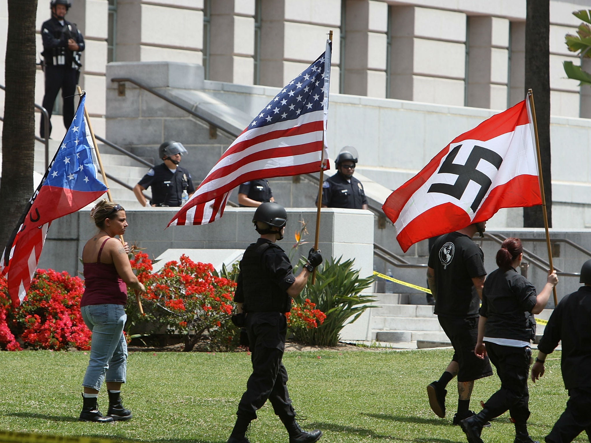 Members of the National Socialist Movement march in Los Angeles, California in 2010