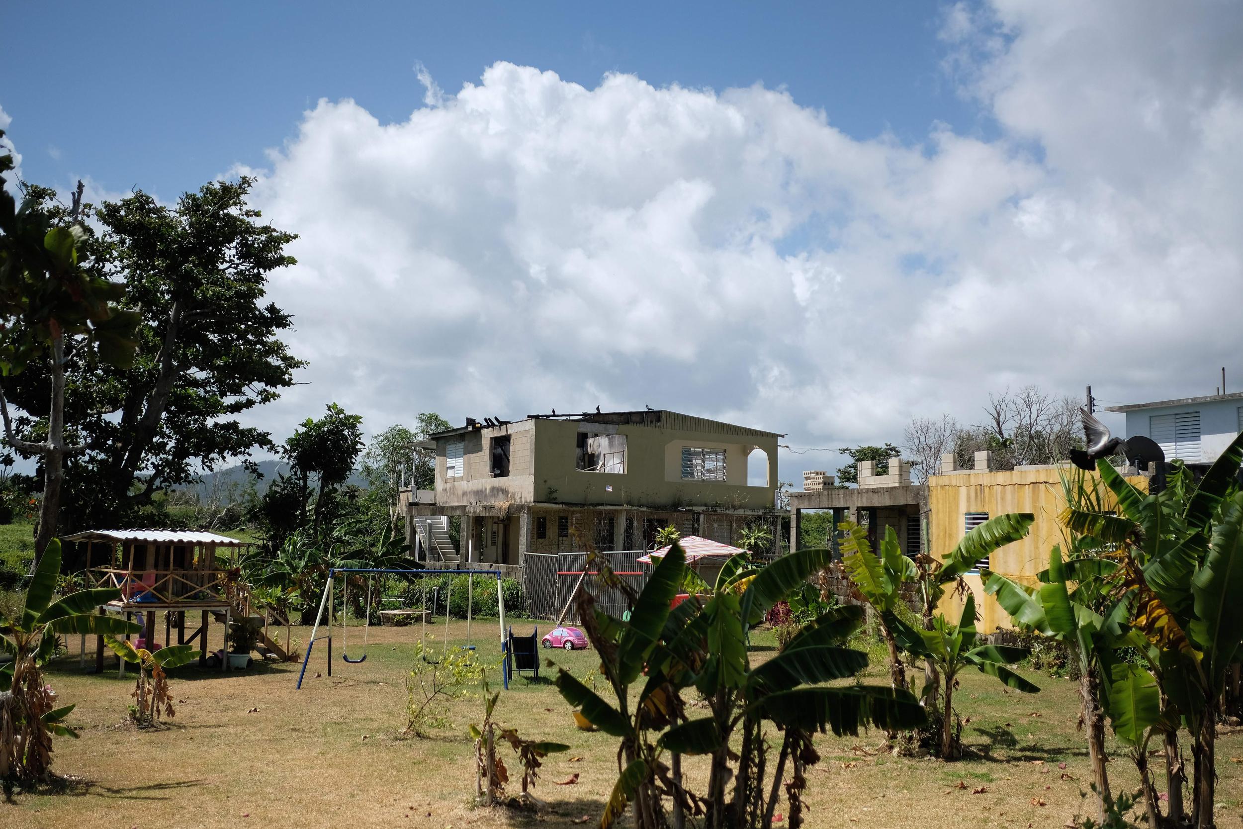 Partially destroyed houses are seen six months after Hurricane Maria affected Puerto Rico in Fajardo (Ricardo Arduengo/AFP/Getty Images)