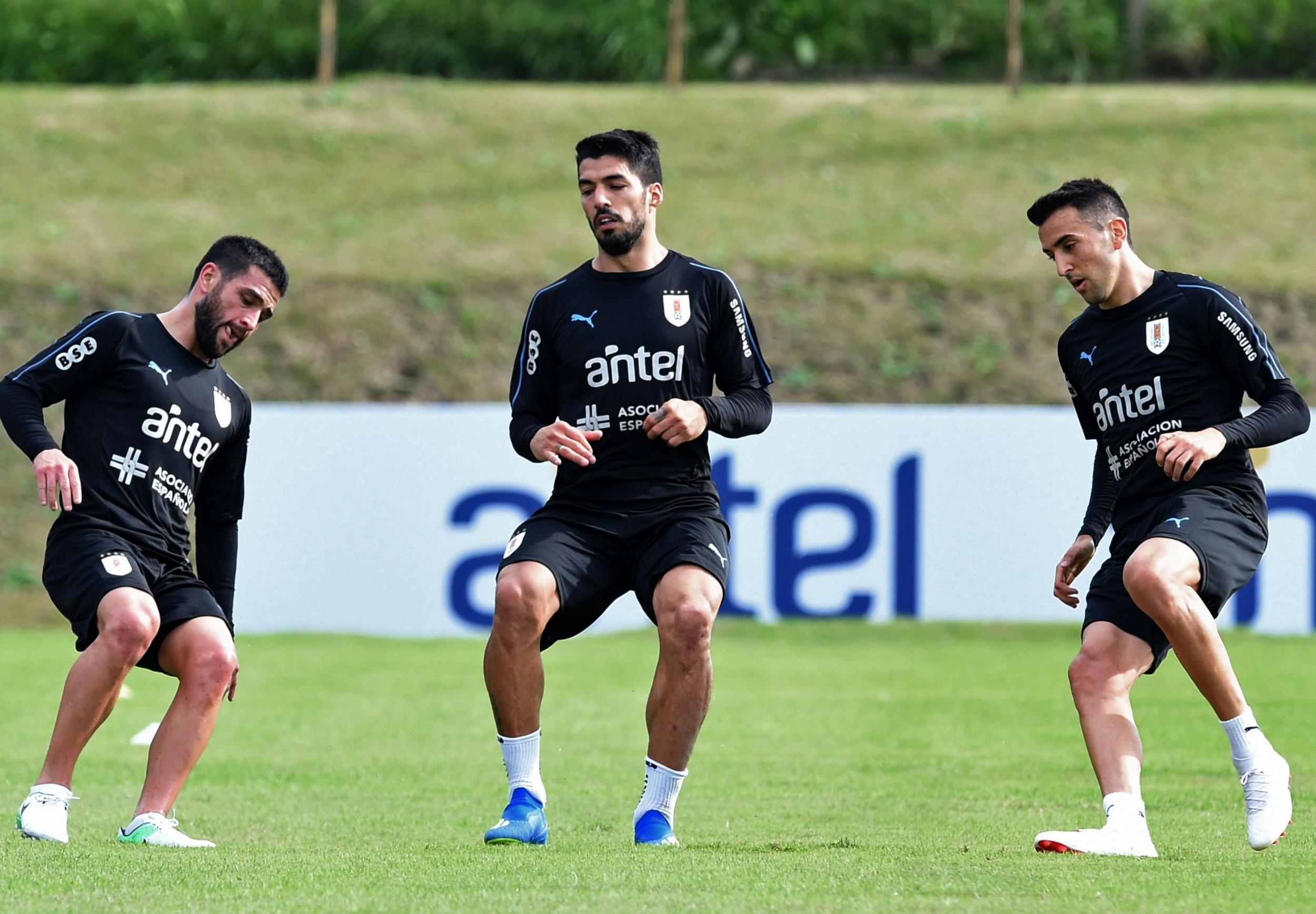 Luis Suarez, centre, is key to Uruguay’s success