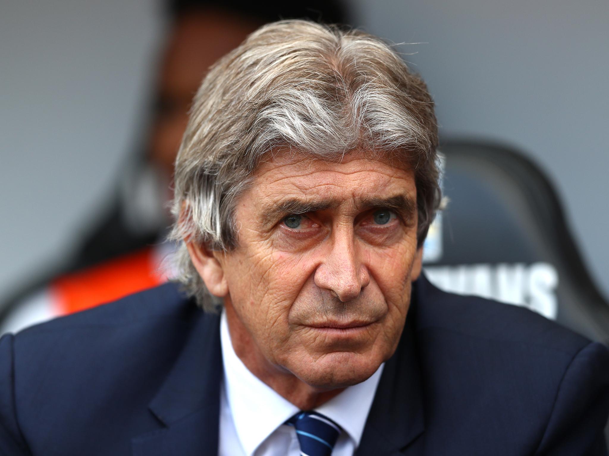 Manuel Pellegrini and his wife Carola Pucci were mugged at gunpoint