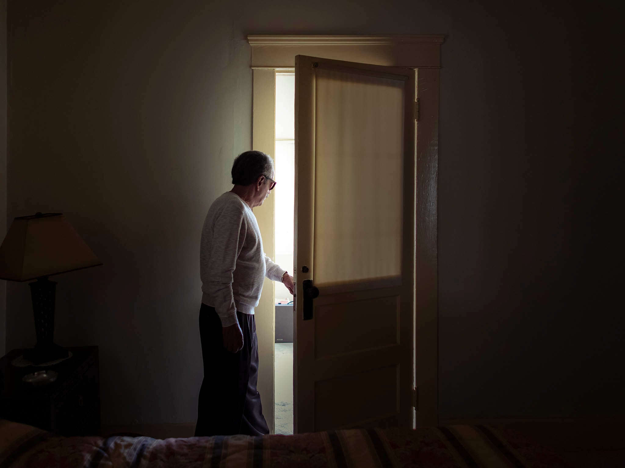 Munir outside his brother Sirhan’s room at the family home in Pasadena (Philip Cheung/Washington Post)