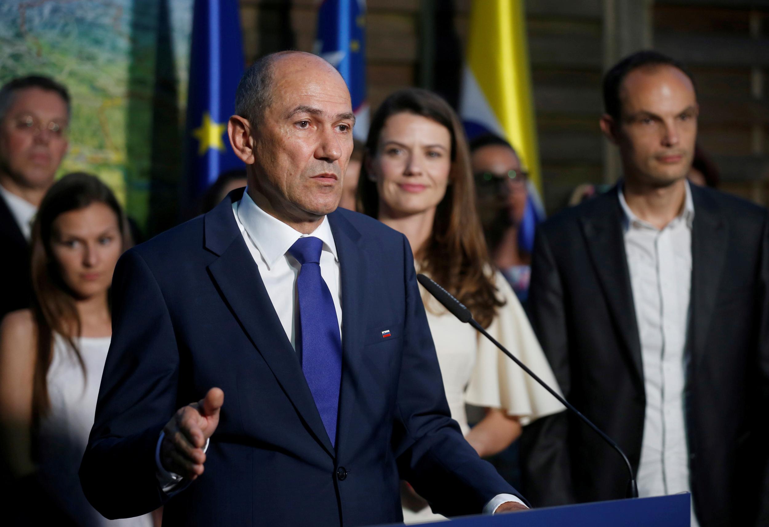 Janez Jansa, leader of the Slovenian Democratic Party (SDS), speaks to the media and supporters after the general election in Ljubljana (REUTERS)