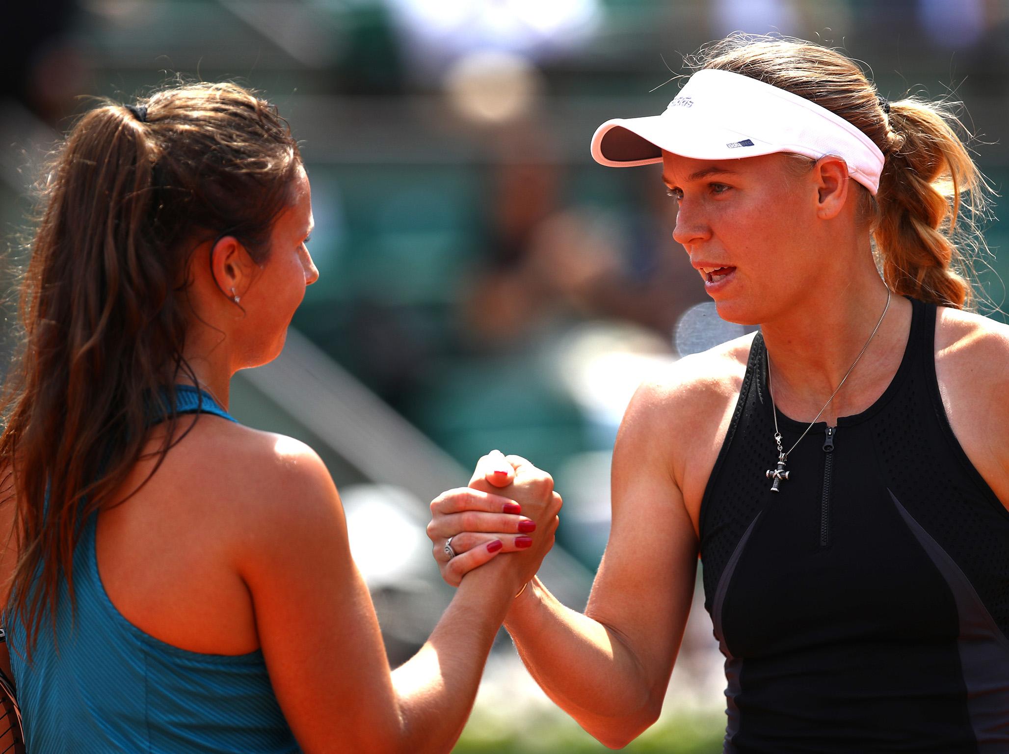 Caroline Wozniacki congratulates Daria Kasatkina after their match