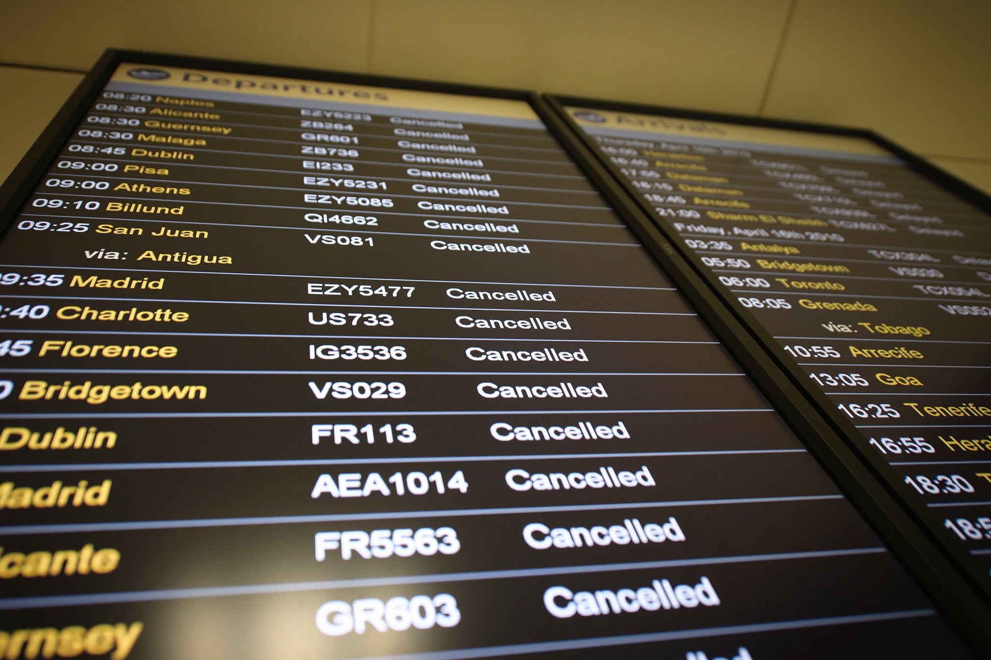 A departure board displays a cancelled flights&nbsp;