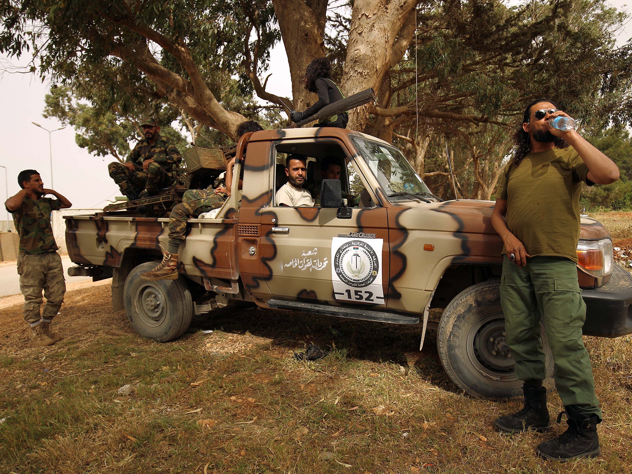 Libyan forces, loyal to Libyan strongman Khalifa Haftar, gather near the coastal city of Derna