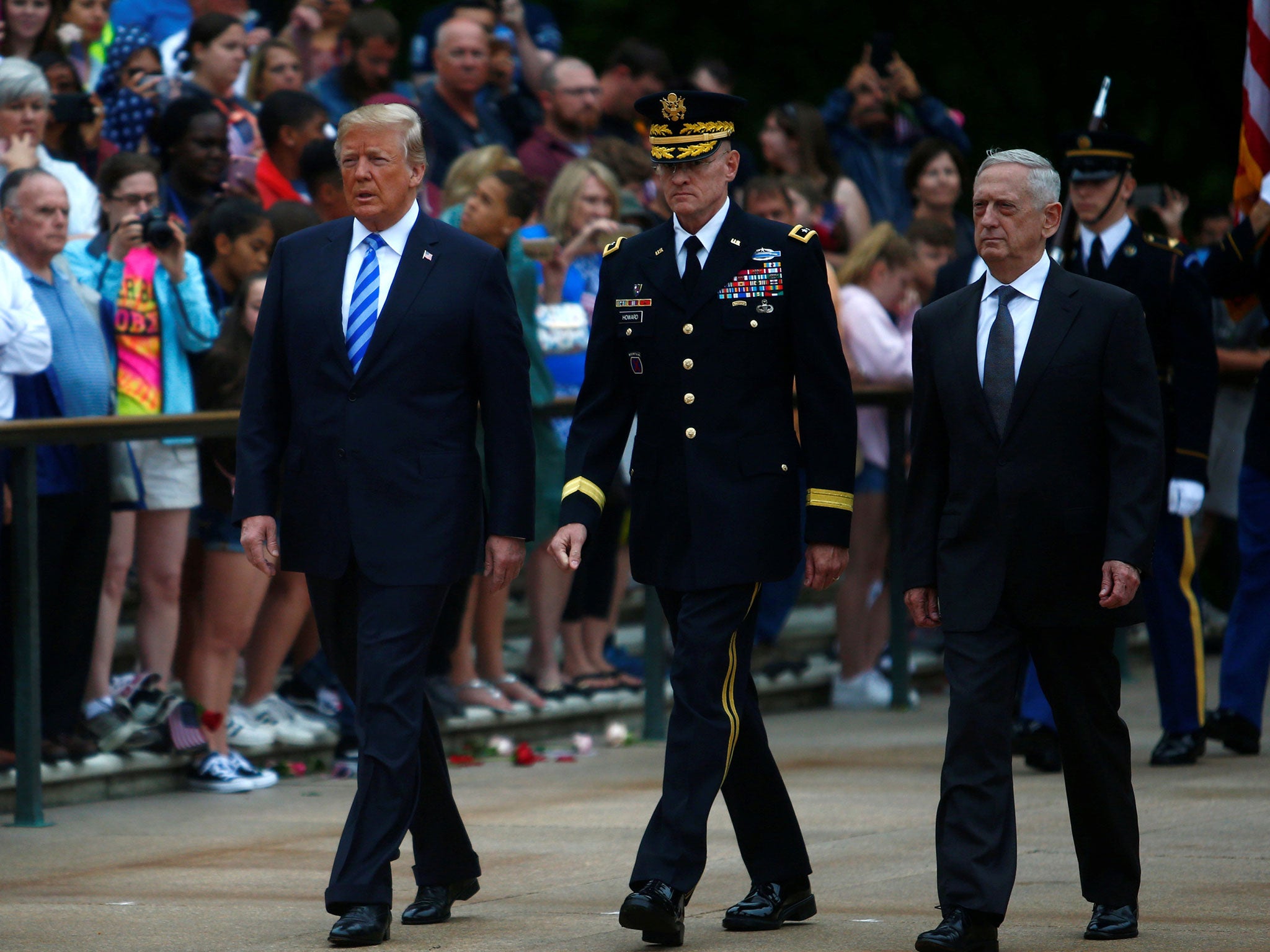 Donald Trump, General Joseph Dunford, chairman of the Joint Chiefs of Staff, and James Mattis, the defence secretary, attend a wreath laying ceremony at the Tomb of the Unknown Soldier at Arlington National Cemetery as part of Memorial Day observance, Arlington