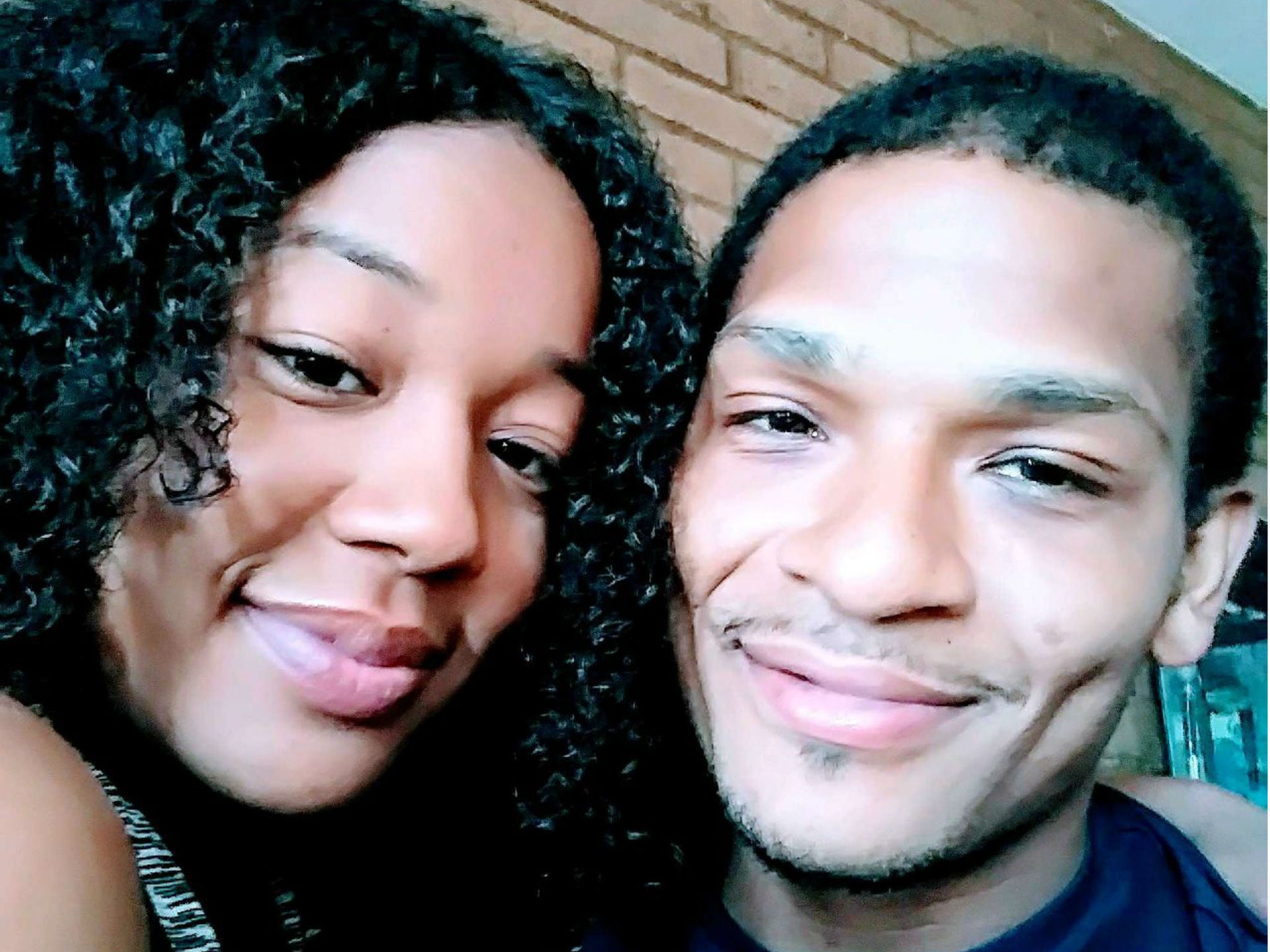 Mr Miller with his fiancé in an undated photo