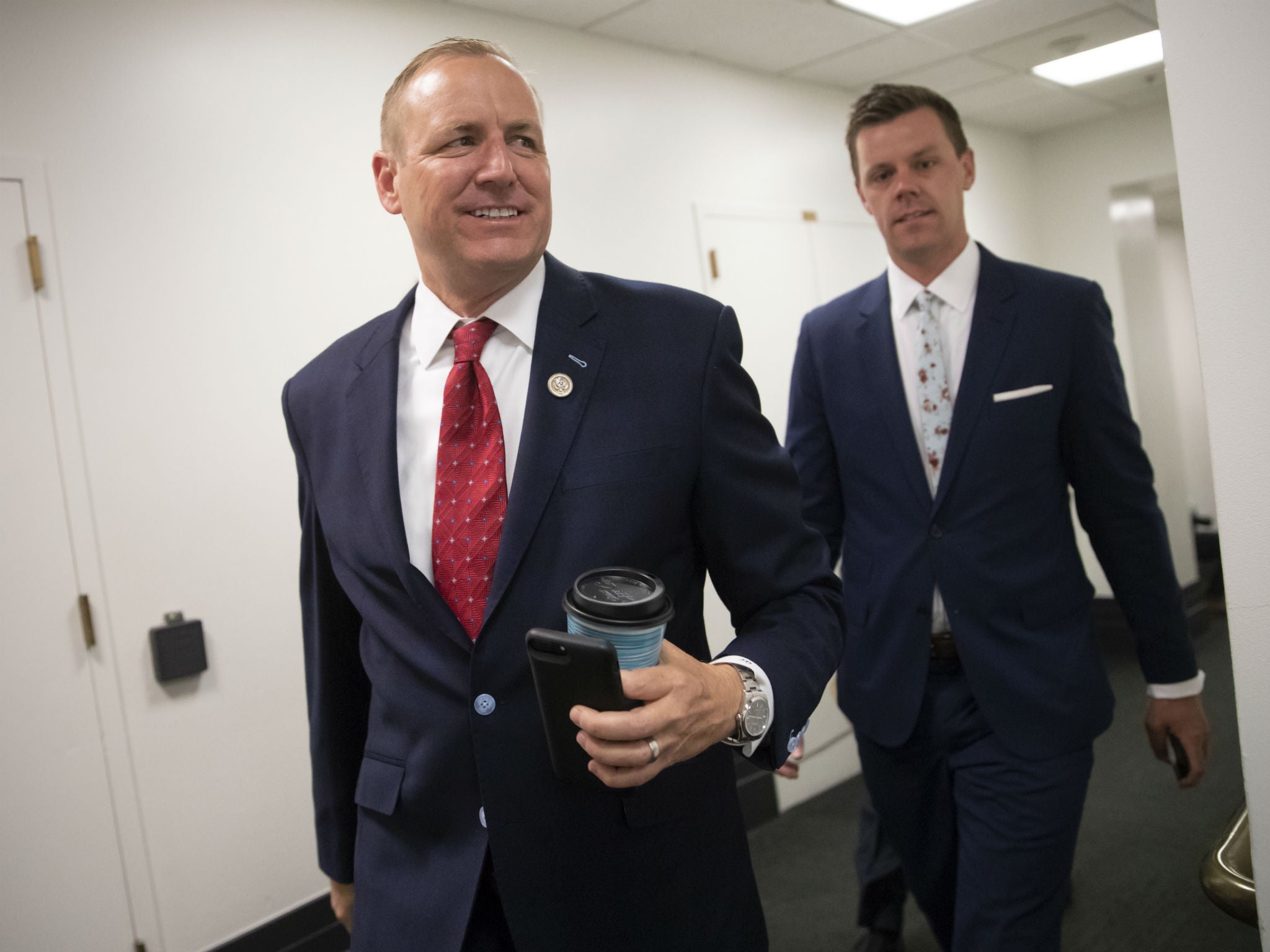 Rep. Jeff Denham arrives for a closed-door GOP meeting in the basement of the Capitol as the Republican leadership tries to reach a policy agreement between conservatives and moderates on immigration