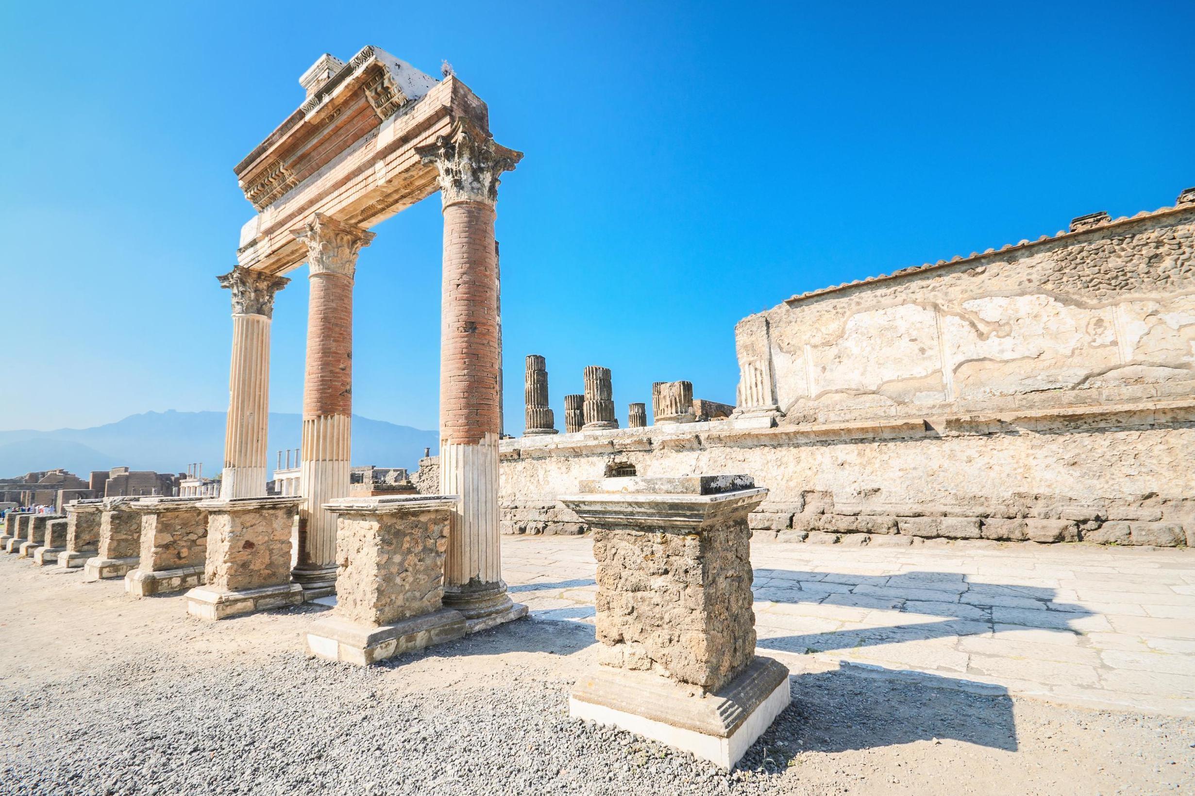 The travel blogger sat atop the ruins of the ancient city of Pompeii (Stock)