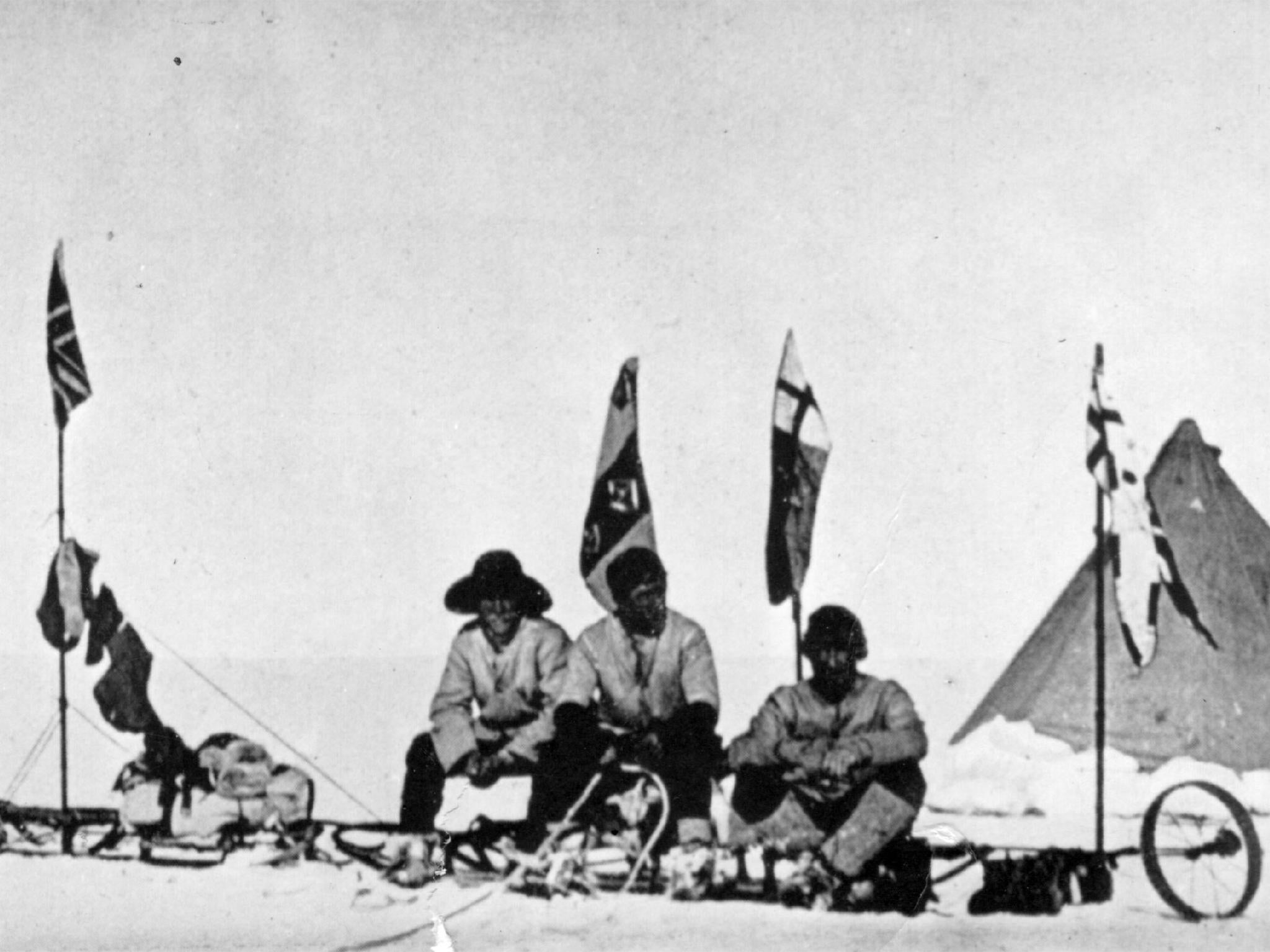 Captain Scott (centre) and Dr Edward Adrian Wilson celebrate Christmas in 1903 (Getty)