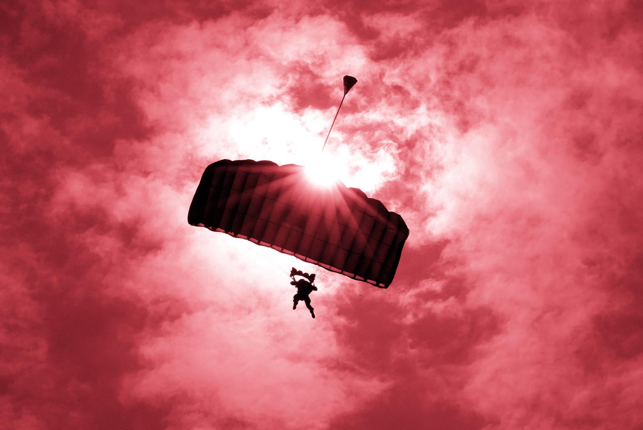 A U.S. Marines' member takes part in parachute drops during their joint exercise with Japan Ground Self Defense Force, named Northern Viper 17 at Hokudaien exercise area in Eniwa, on the northern island of Hokkaido, Japan, August 15, 2017