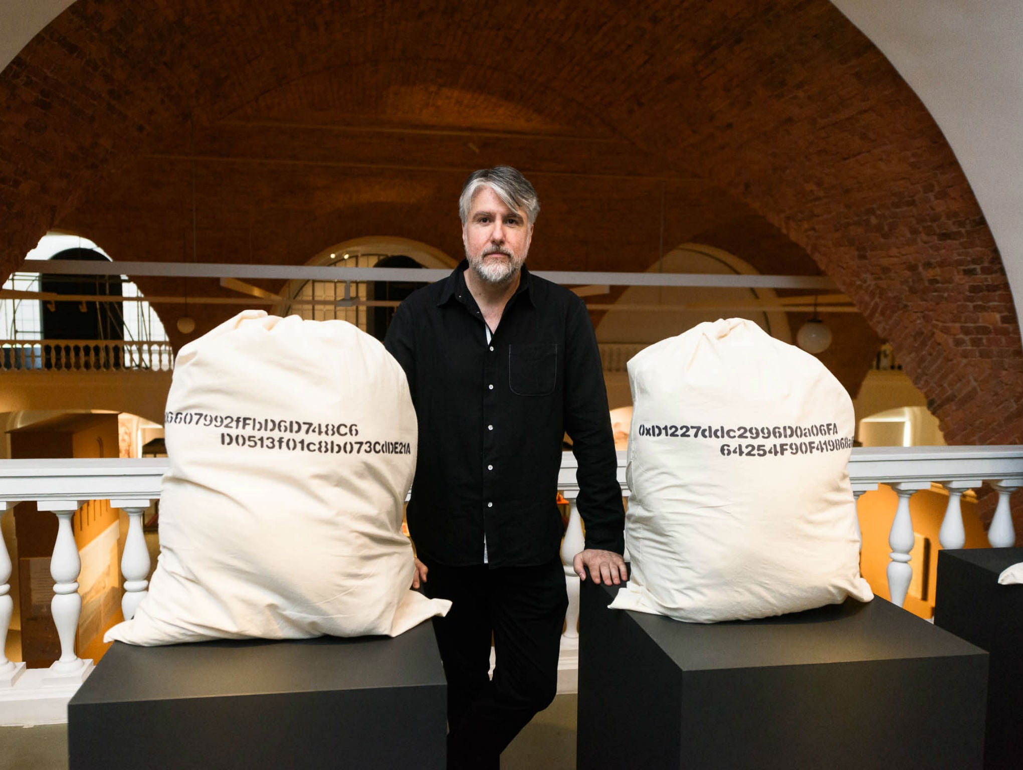 The artist with his ‘Personal Effects’ installation