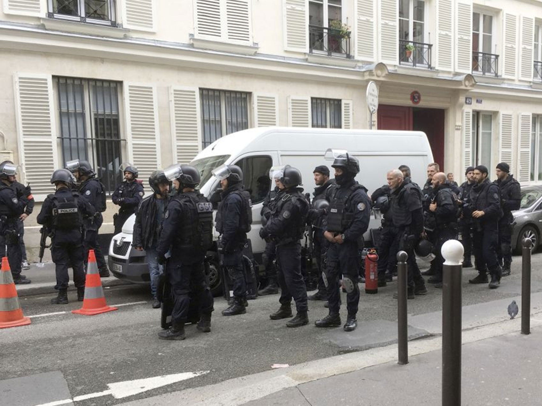 Police officers at the scene of an hostage-taking in Paris