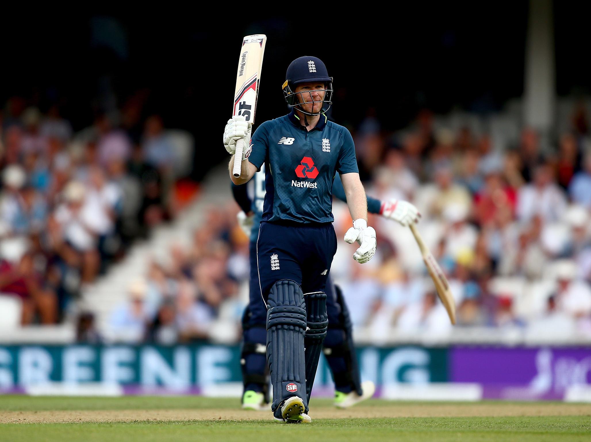 Eoin Morgan celebrates his 50 at the Oval