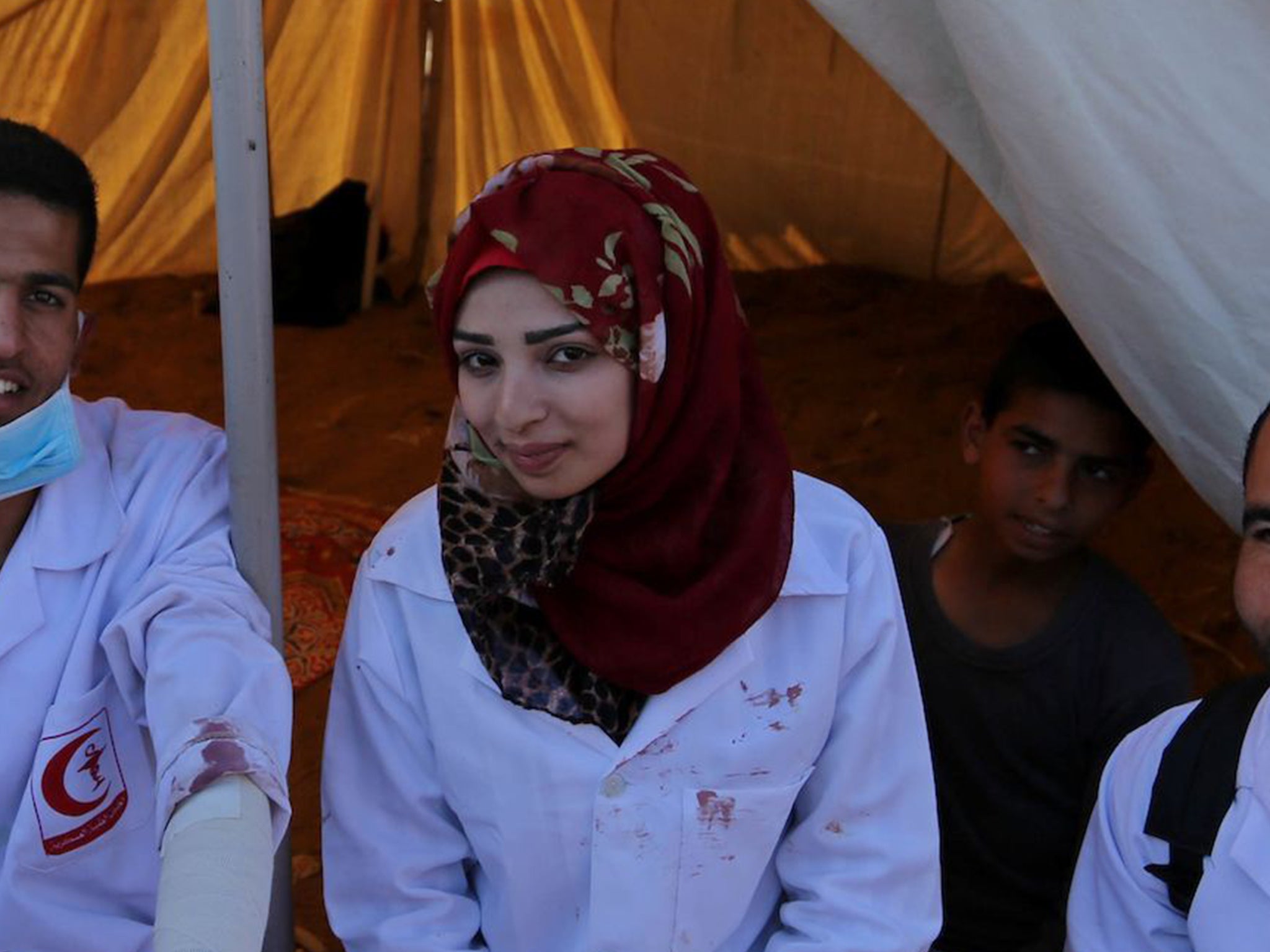 Najjar was often photographed on the front line with the blood of her patients spattered on her white medic’s uniform