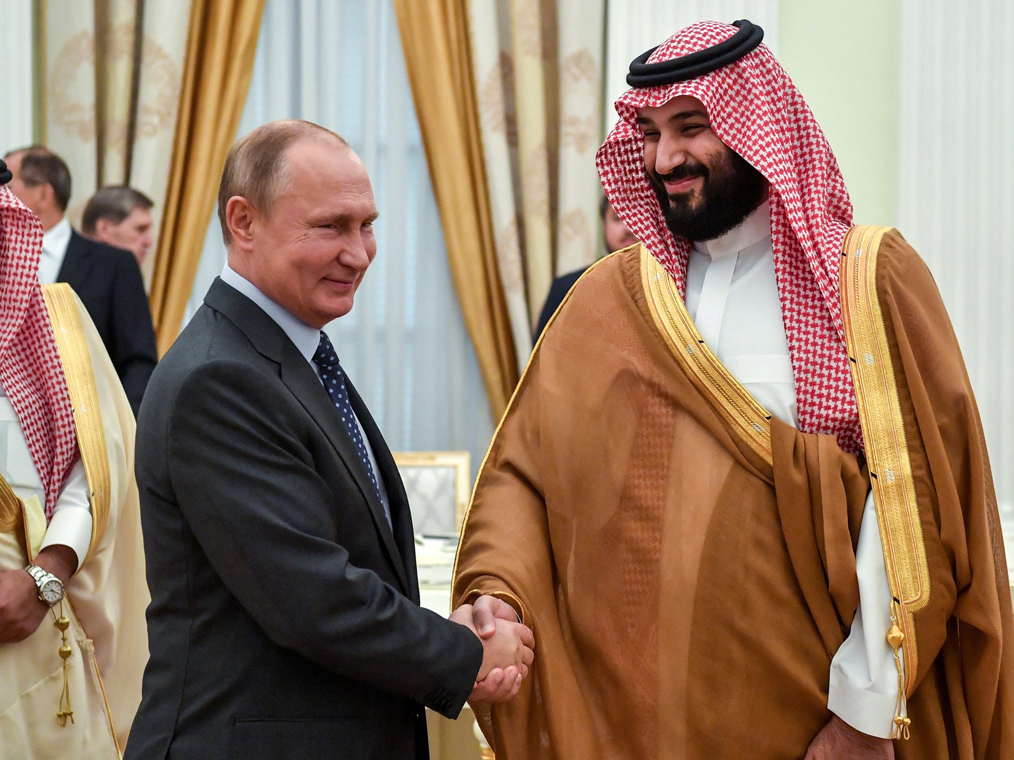 Vladimir Putin and Saudi Crown Prince Mohammed bin Salman