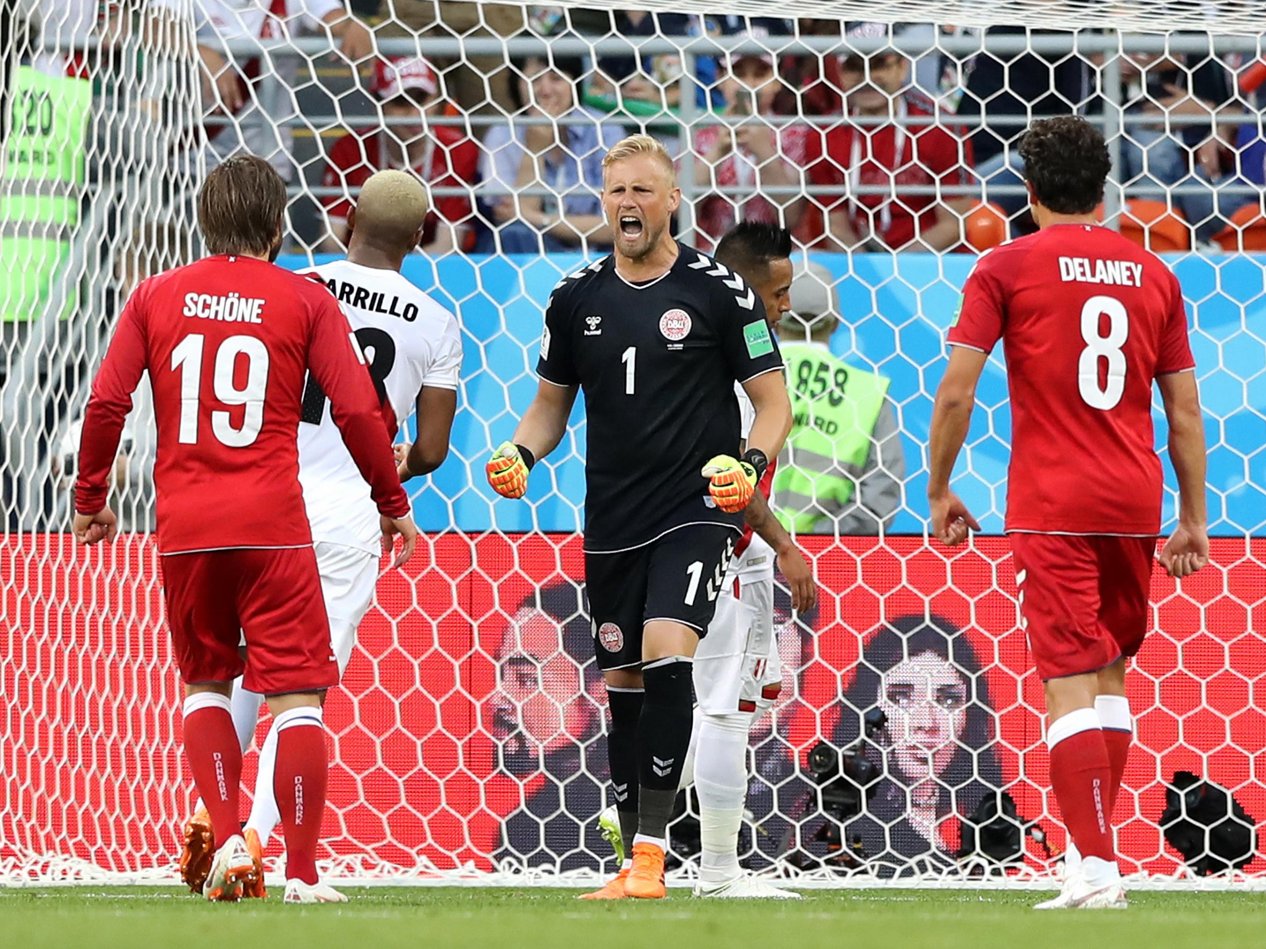 &#13;
Kasper Schmeichel celebrates after Christian Cueva's penalty miss &#13;