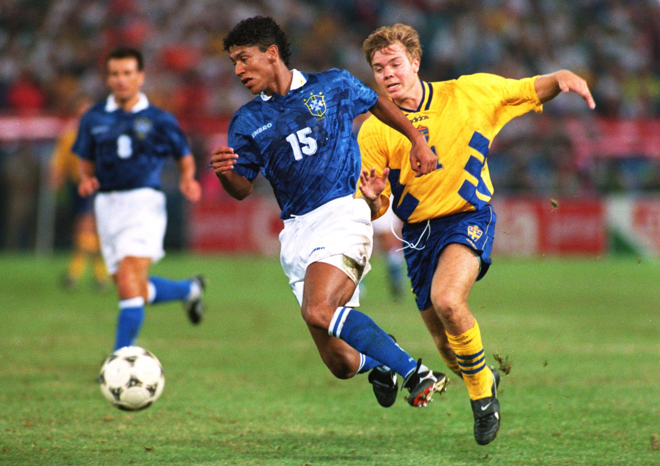 Thomas Brolin chases Marcio Santos as Brazil and Sweden drew 1-1 in the group stage