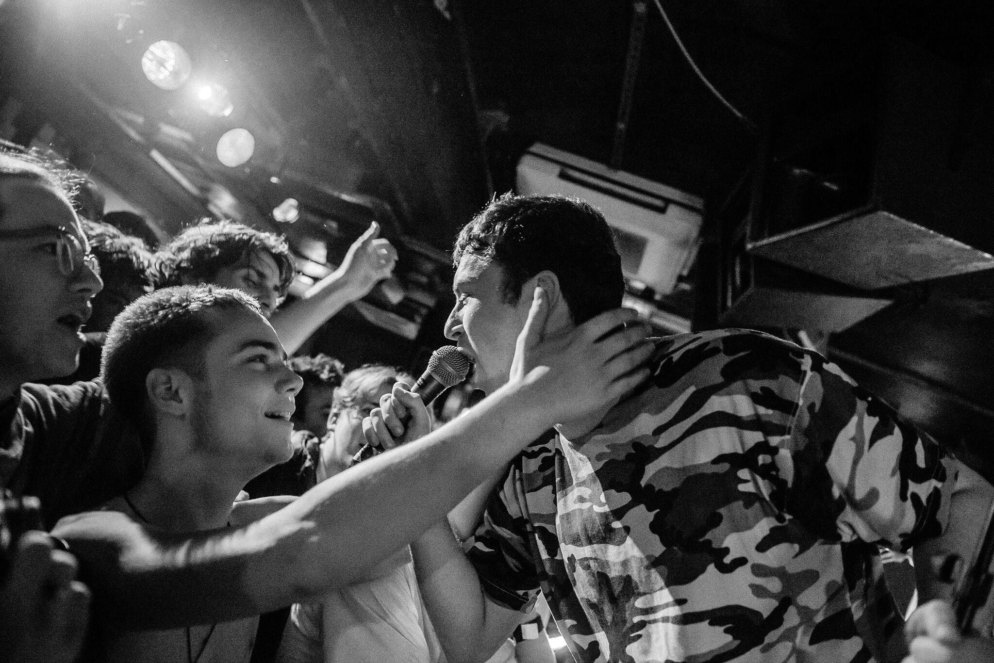 A photo of British post-punk band Shame performing at the 100 Club, featured in a book about the venue's history