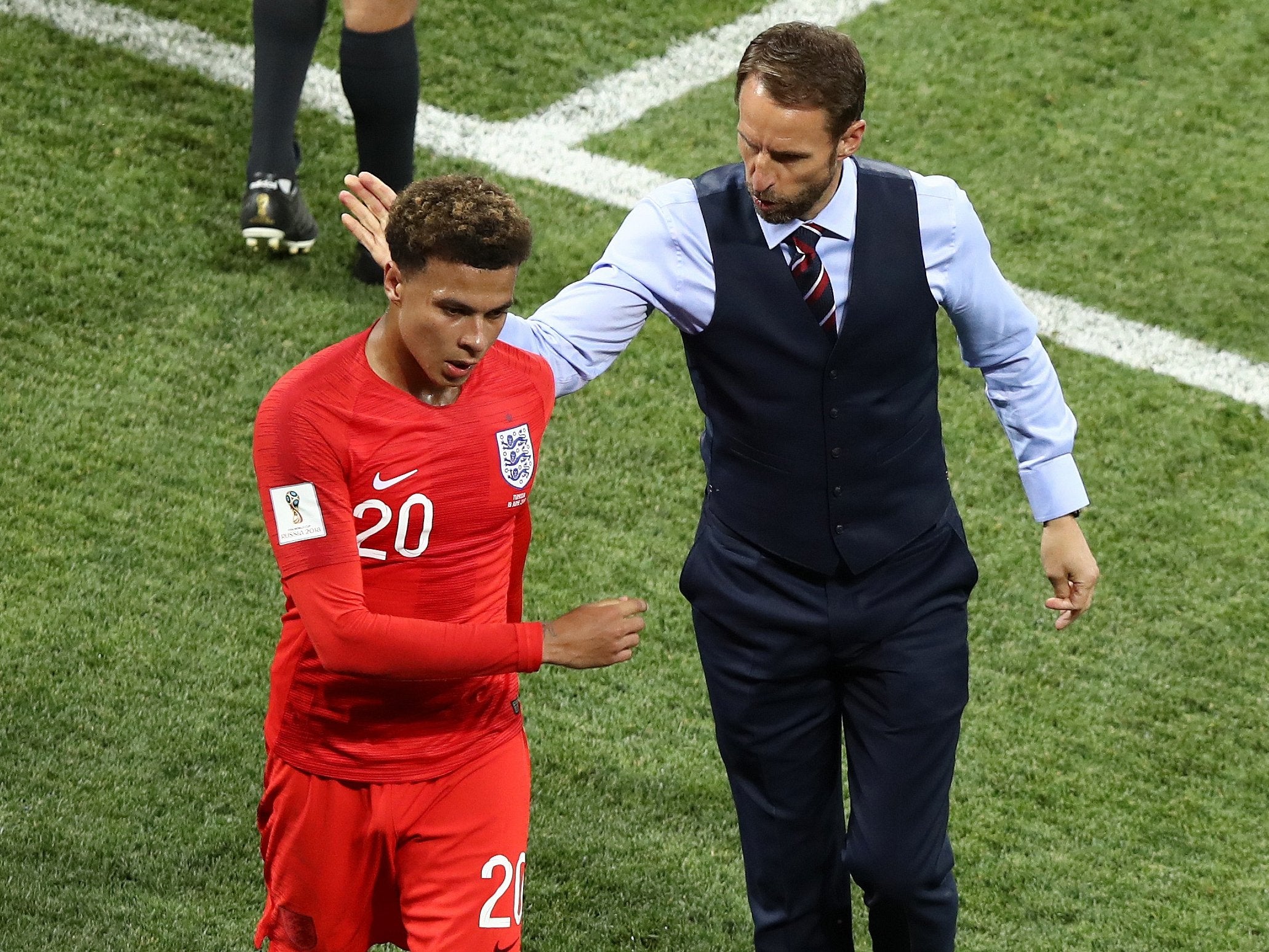 Gareth Southgate consoles Dele Alli after he's been replaced