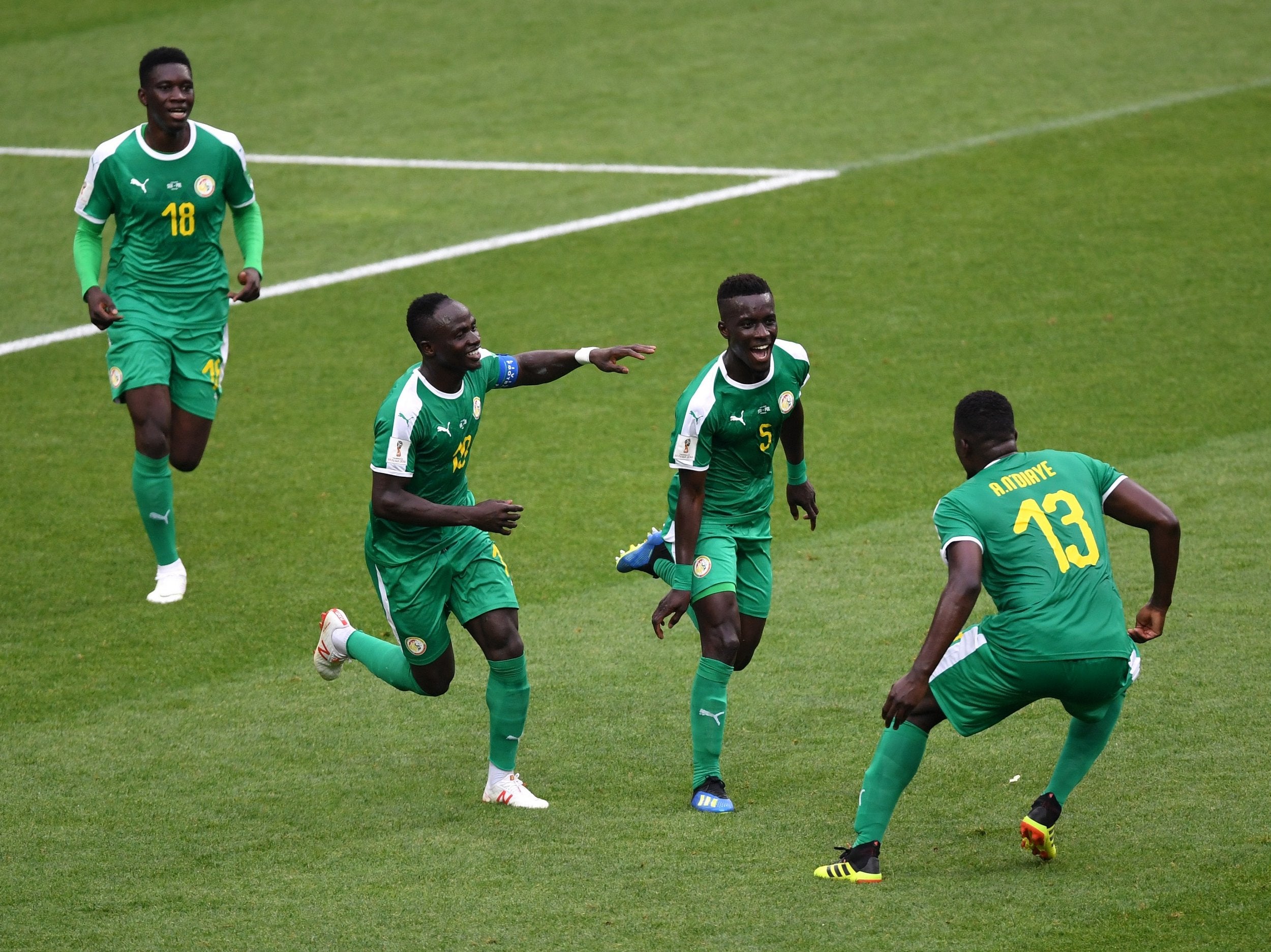 Idrissa Gana Gueye of Senegal celebrates the first Senegal goal