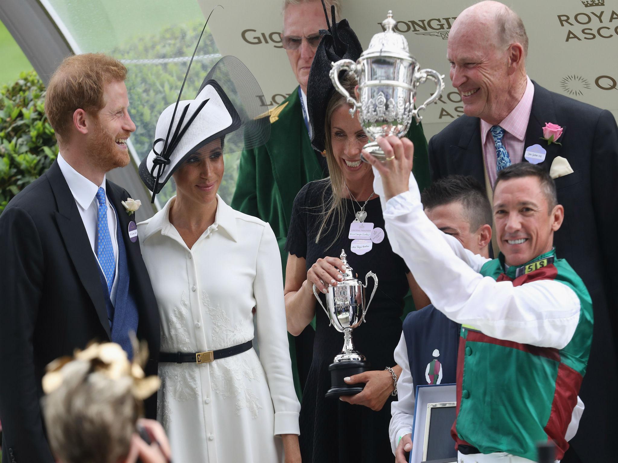 Dettori was presented with the trophy by the Duke and Duchess of Sussex after winning on Without Parole