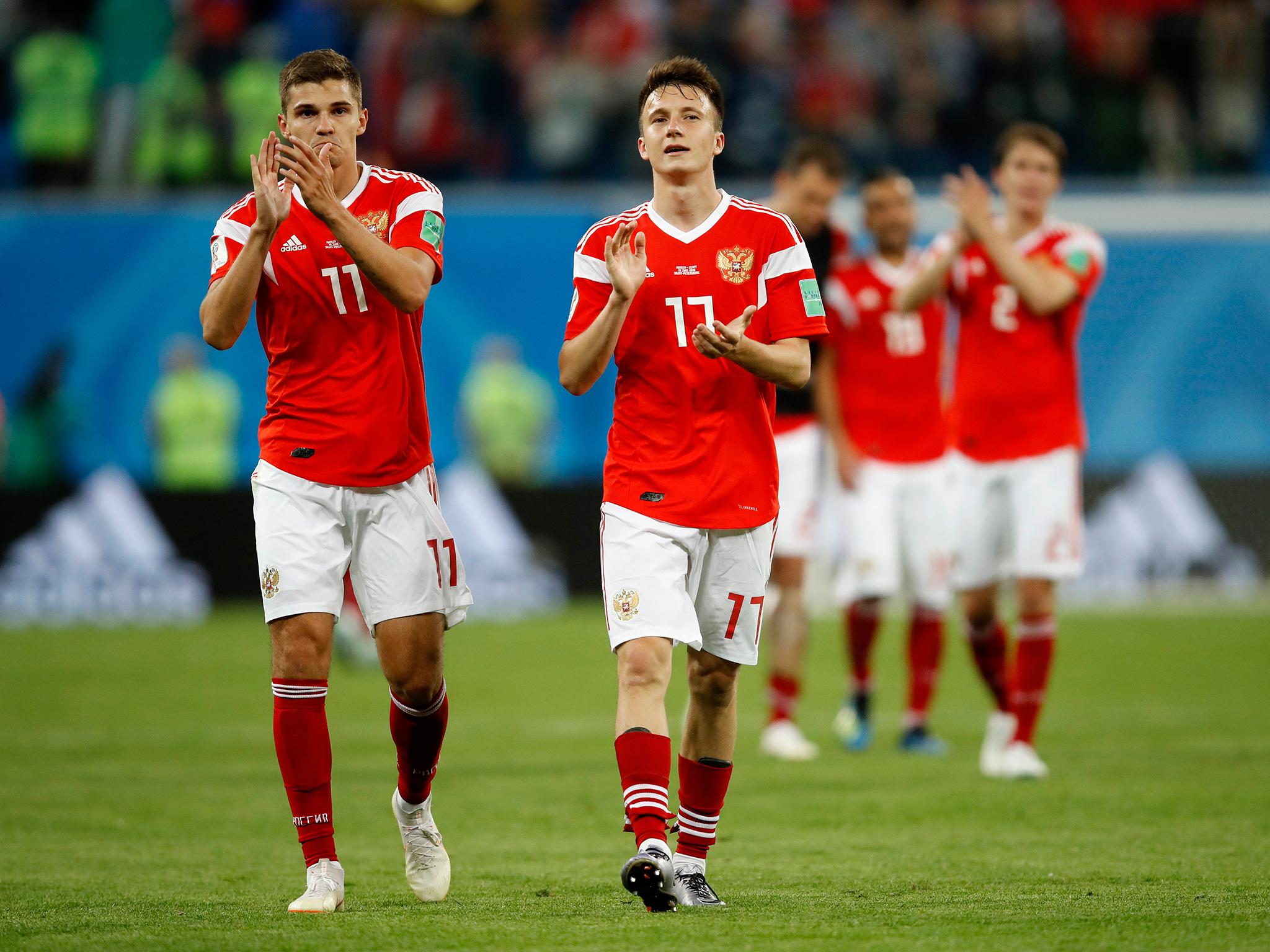 Aleksandr Golovin (right) has run further so far in the World Cup than any other player