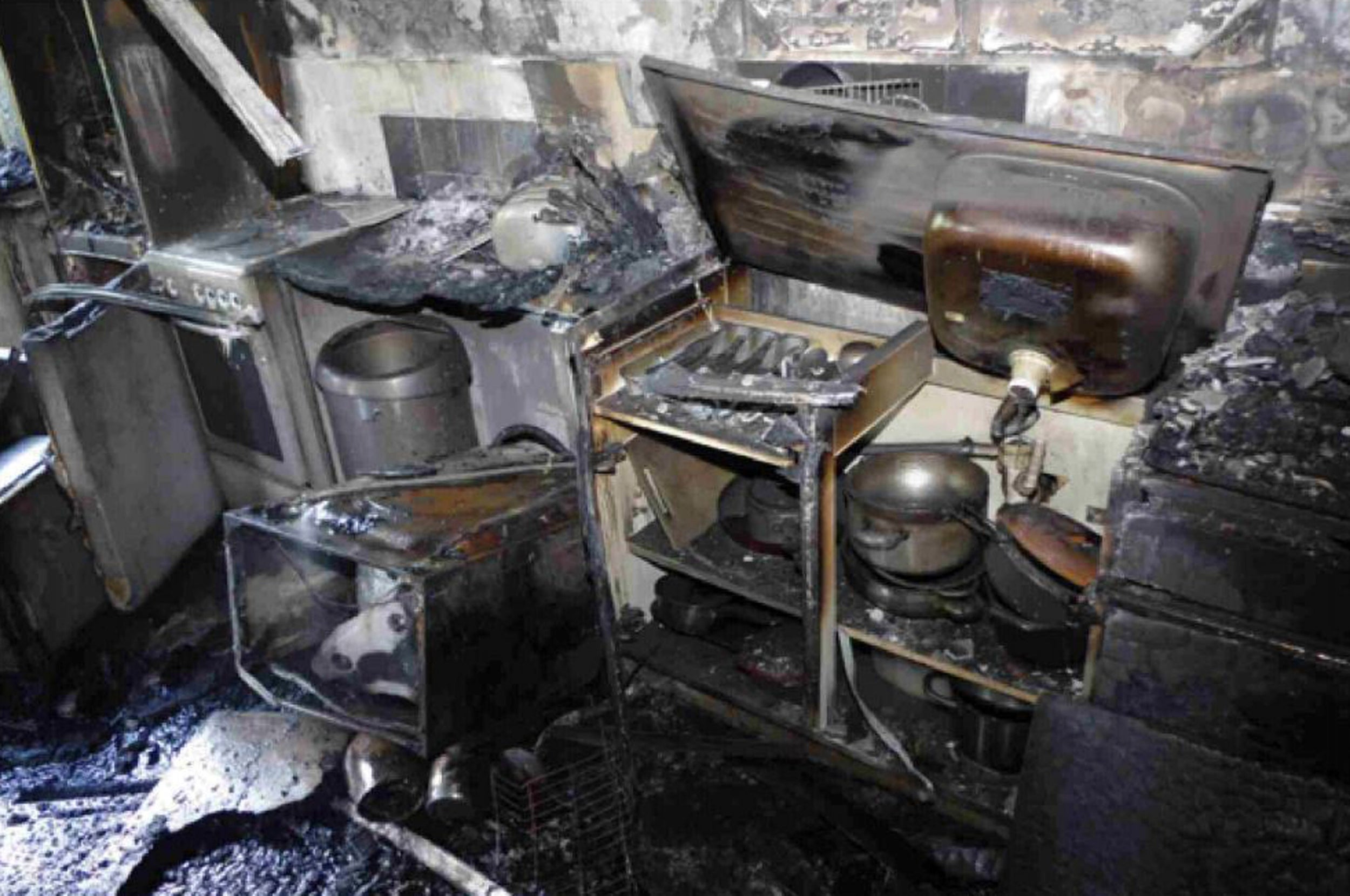 Fire experts say the blaze started in Behailu Kebede's kitchen