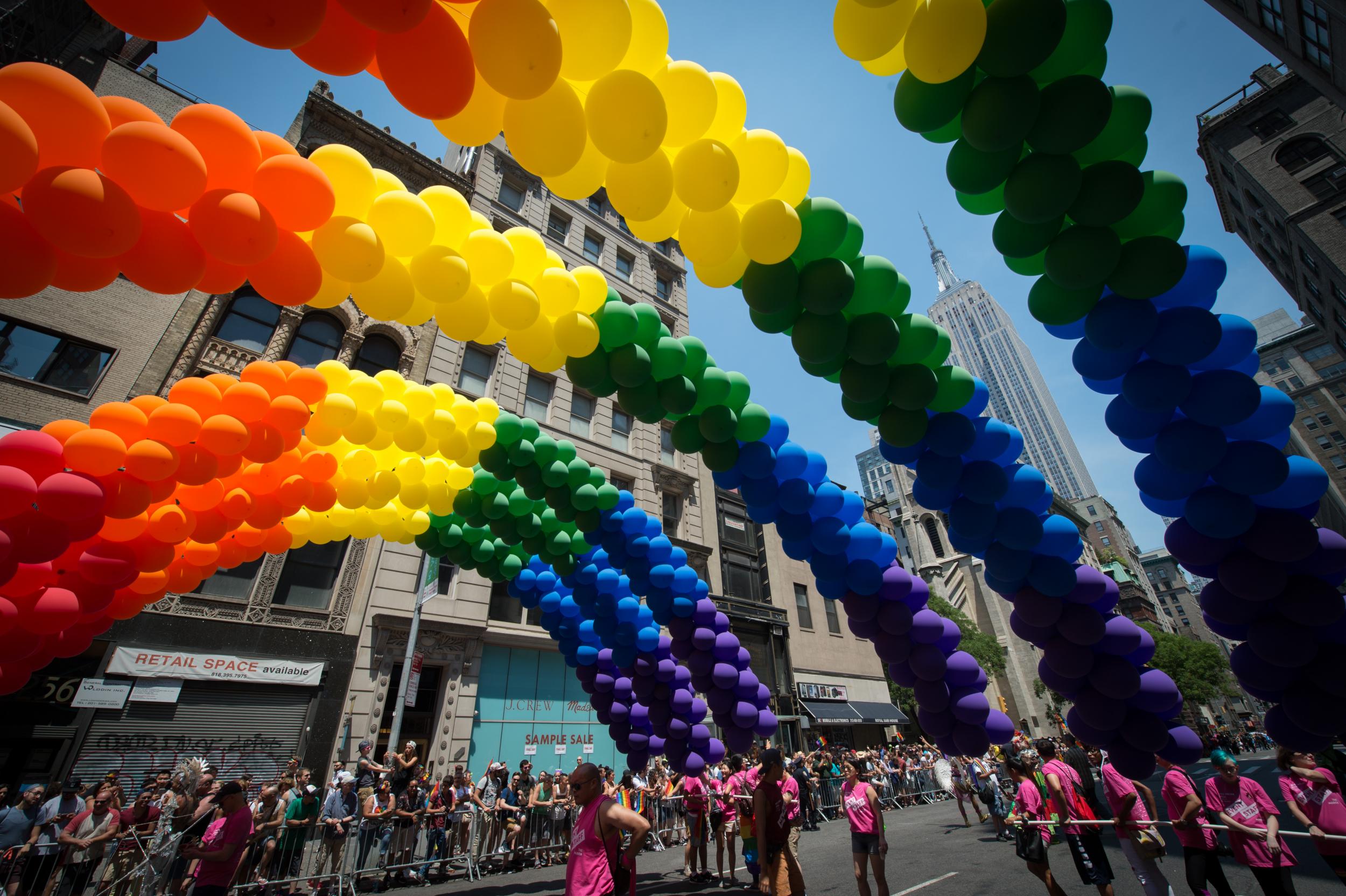 The Empire State Building is seen behind rainbow balloons during the 46th annual Gay Pride march June 26, 2016 in New York