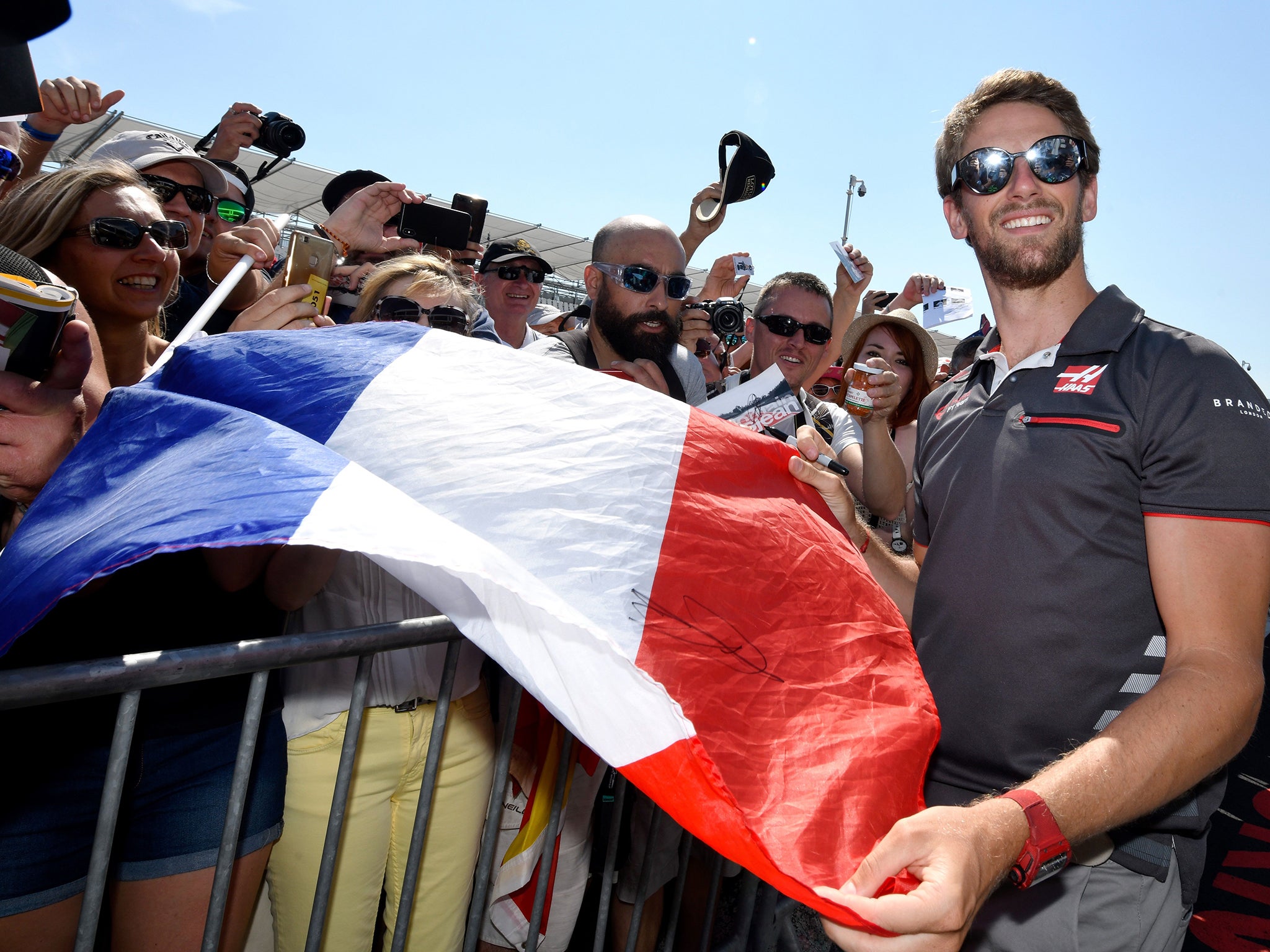 Romain Grosjean soaks up the adulation of his home fans at Paul Ricard