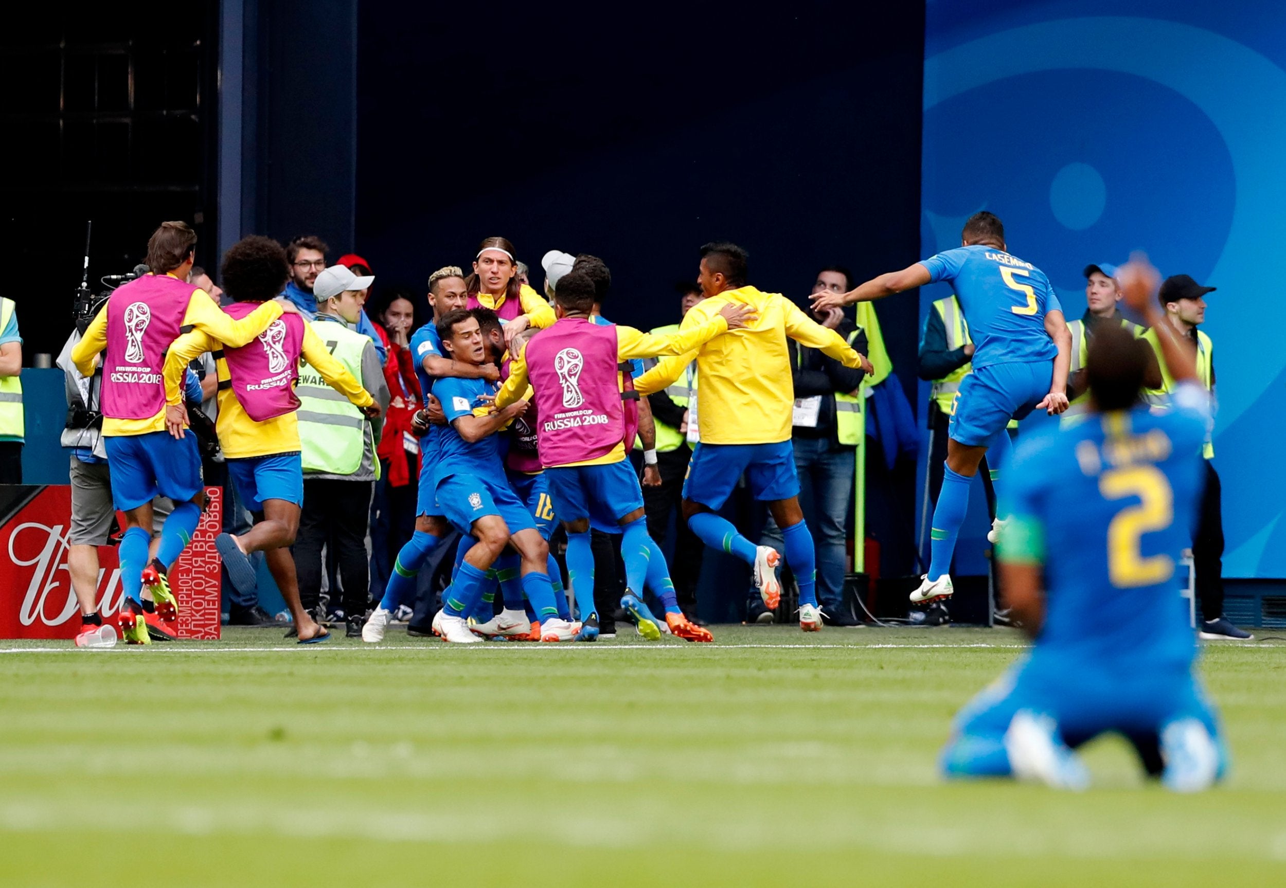 Philippe Coutinho is mobbed by his team-mates