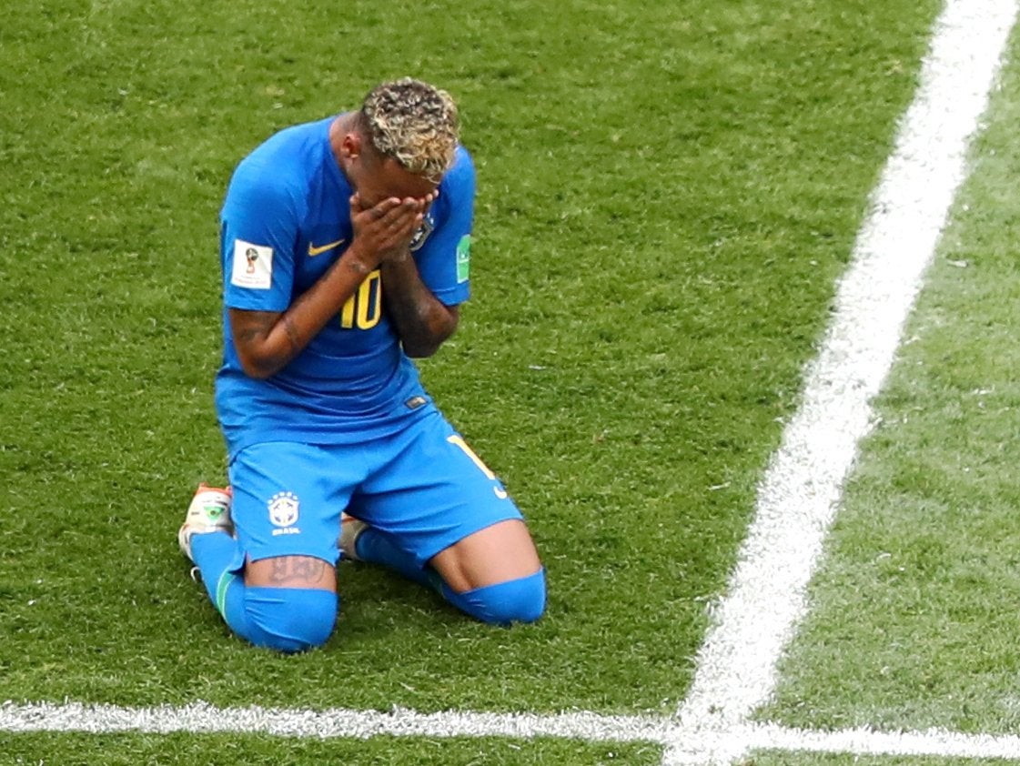 Neymar of Brazil reacts after scoring the 2-0 goal