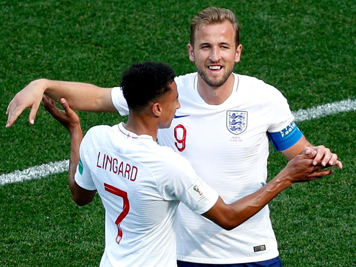 Harry Kane of England (R) celebrates with (L) Jesse Lingard of England scoring