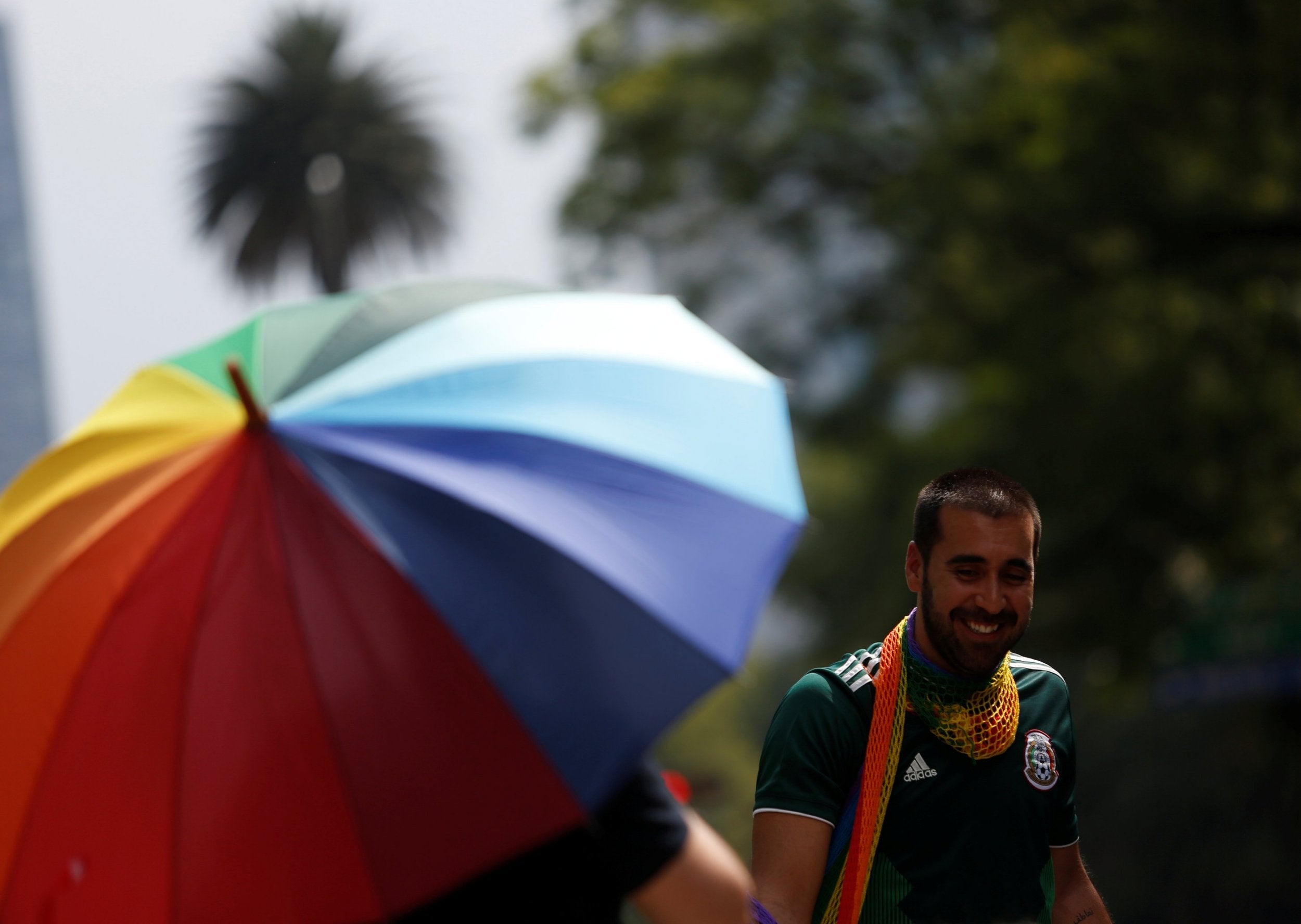 While some supporters could be seen waving rainbow flags, others brandished Mexican flags, and some even sported both