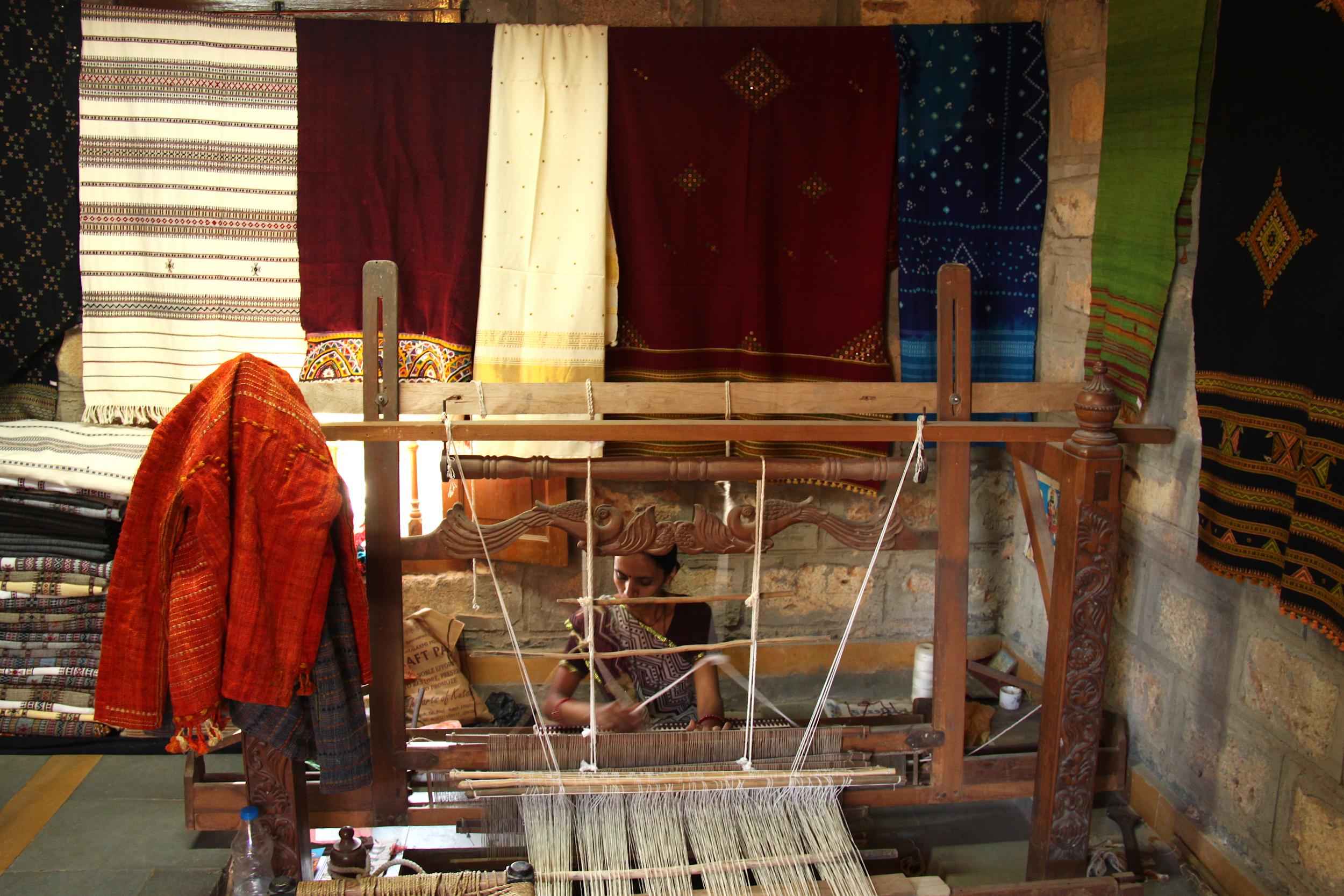 A Kutchi woman at a local weaving centre