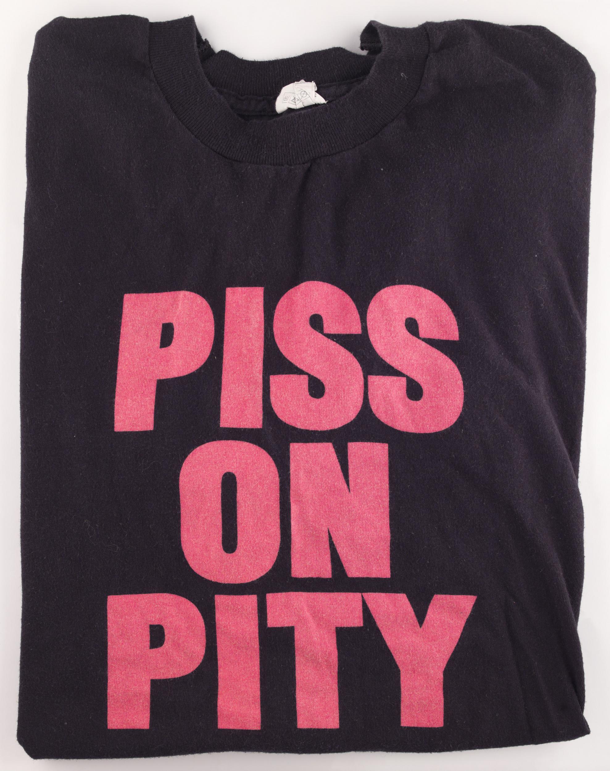 The archive features the ‘Piss on Pity’ slogan T-shirt