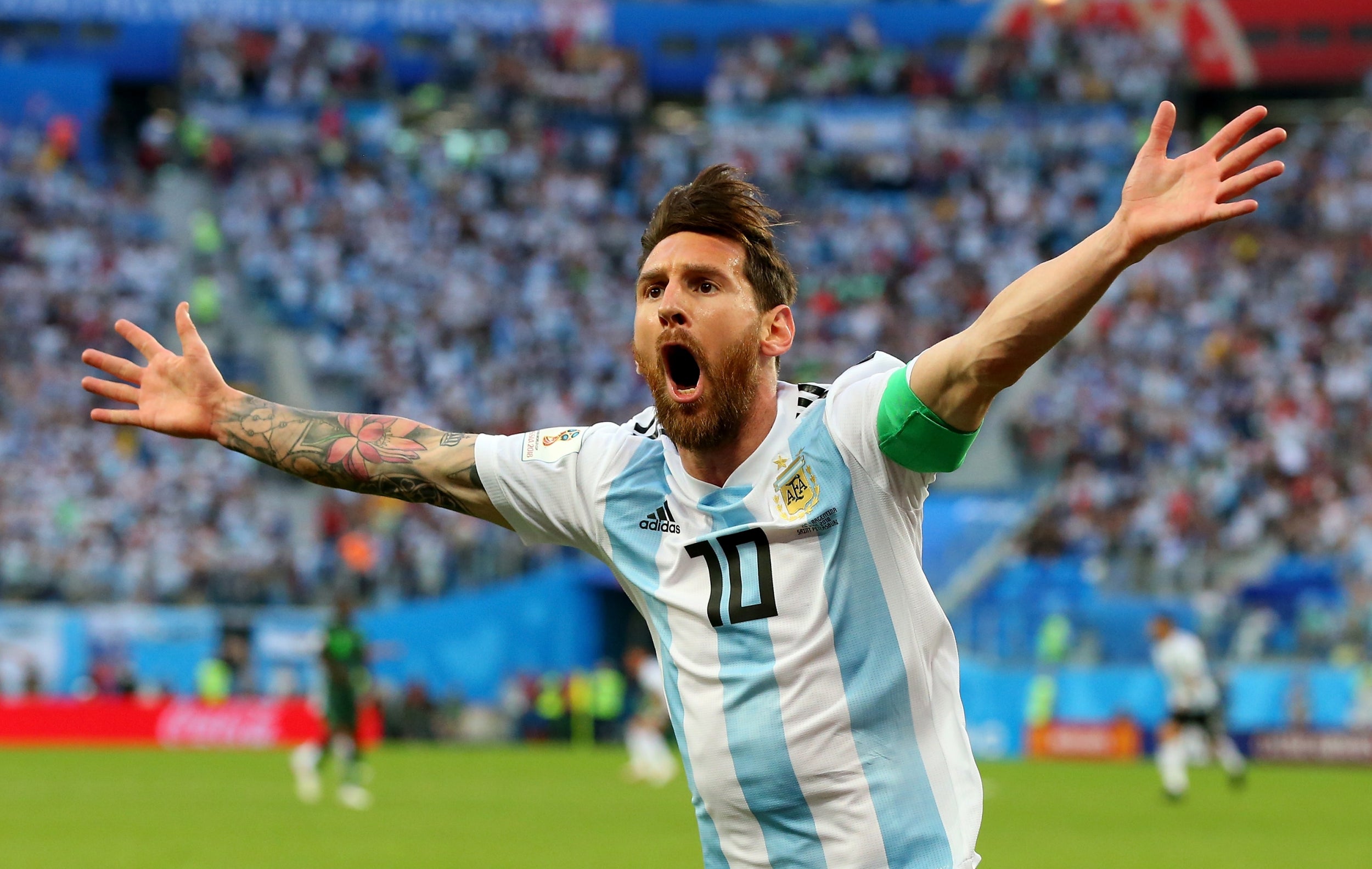 Lionel Messi celebrates Argentina's opening goal