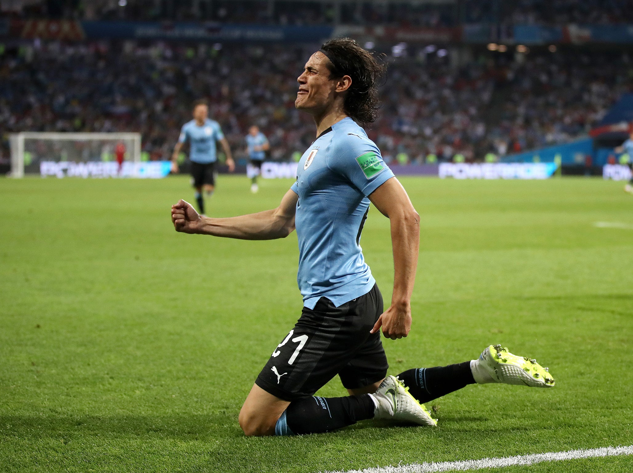 Cavani celebrates his opening goal