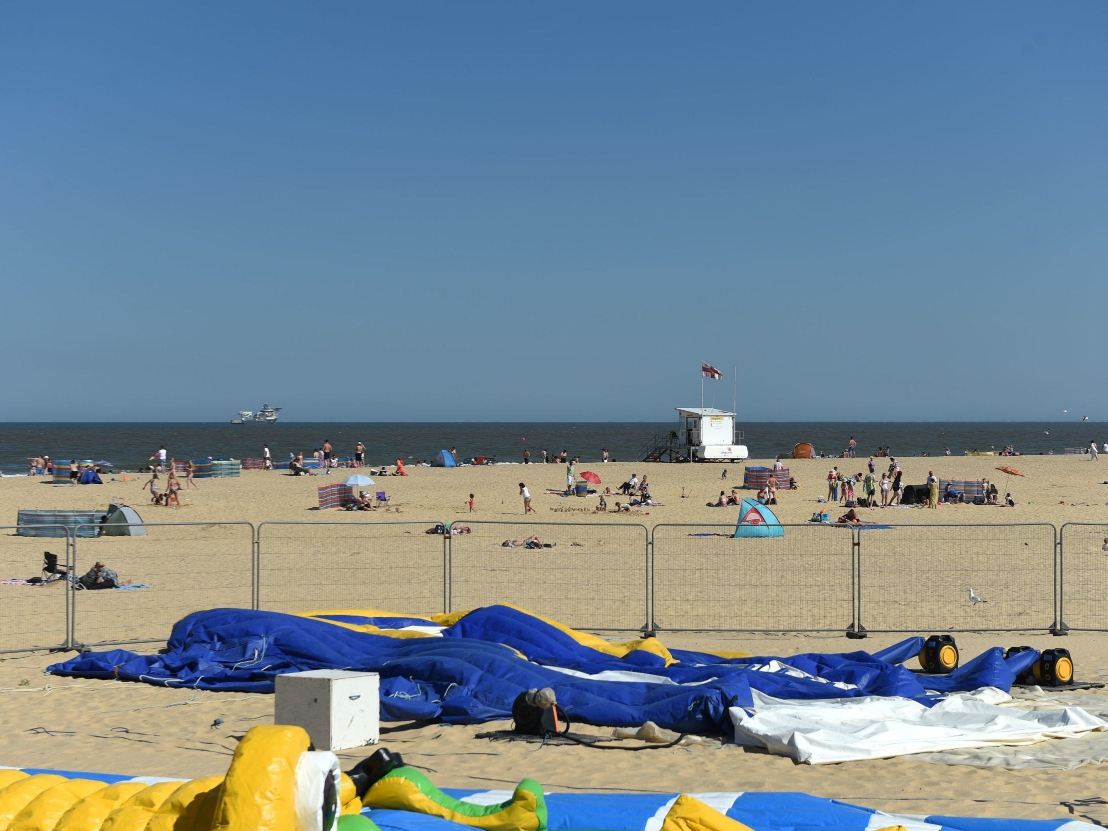 The scene on Gorleston beach in Norfolk, after a young girl died after reportedly being thrown from a bouncy castle