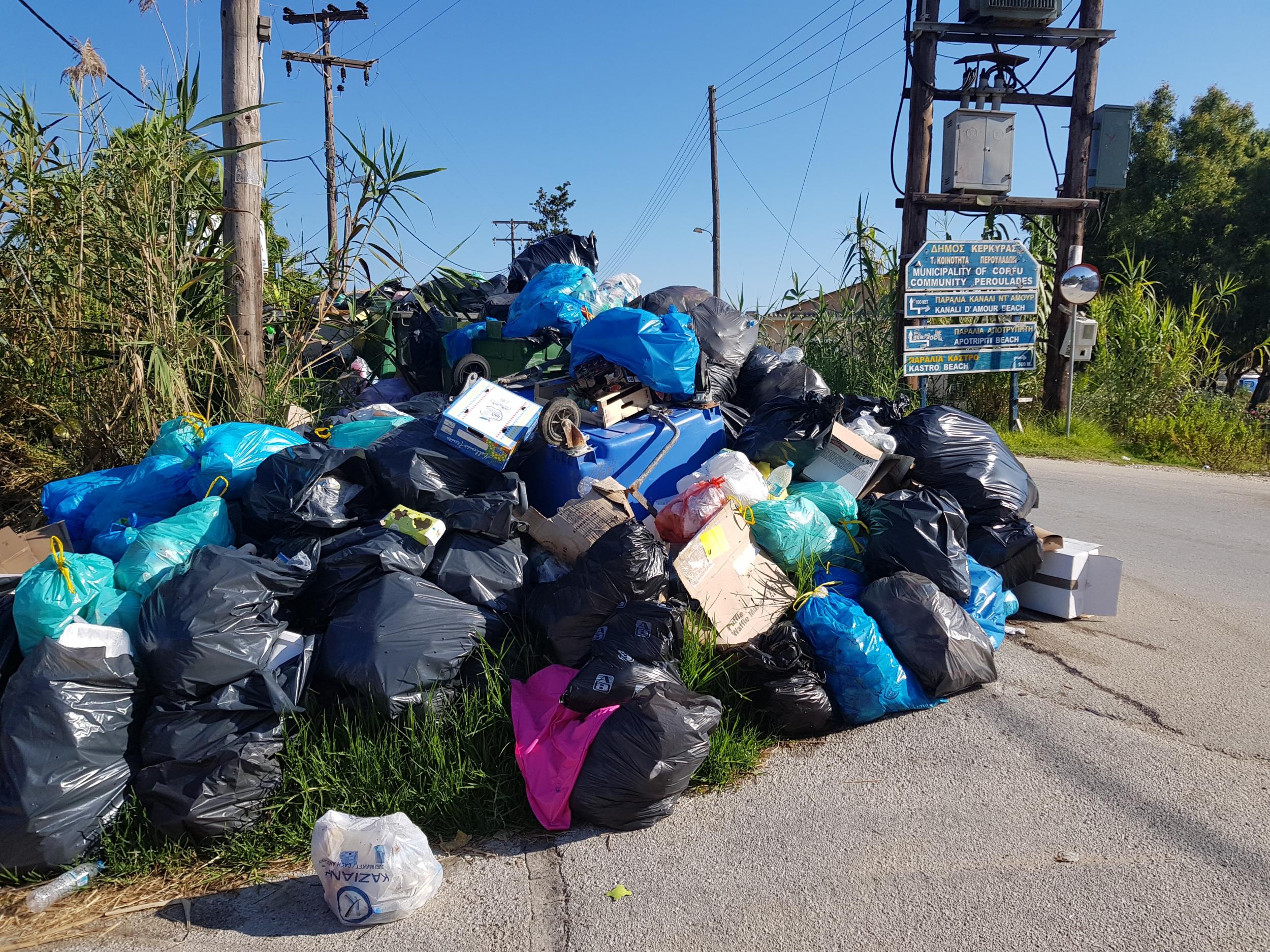 Rubbish holiday? Refuse piled up in the resort of Sidari on the island of Corfu