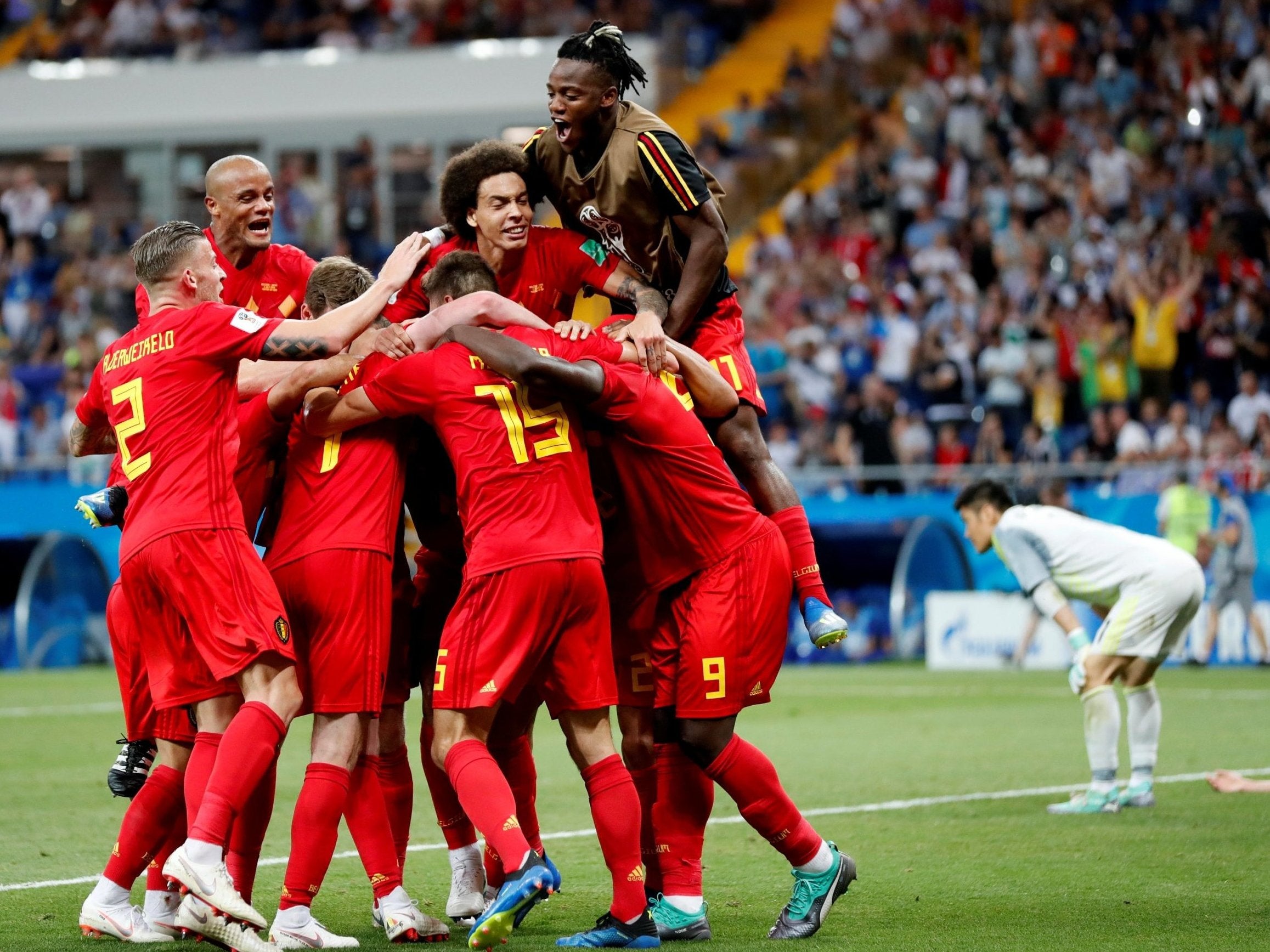 Belgium celebrate Nacer Chadli's 95th minute winning goal against Japan