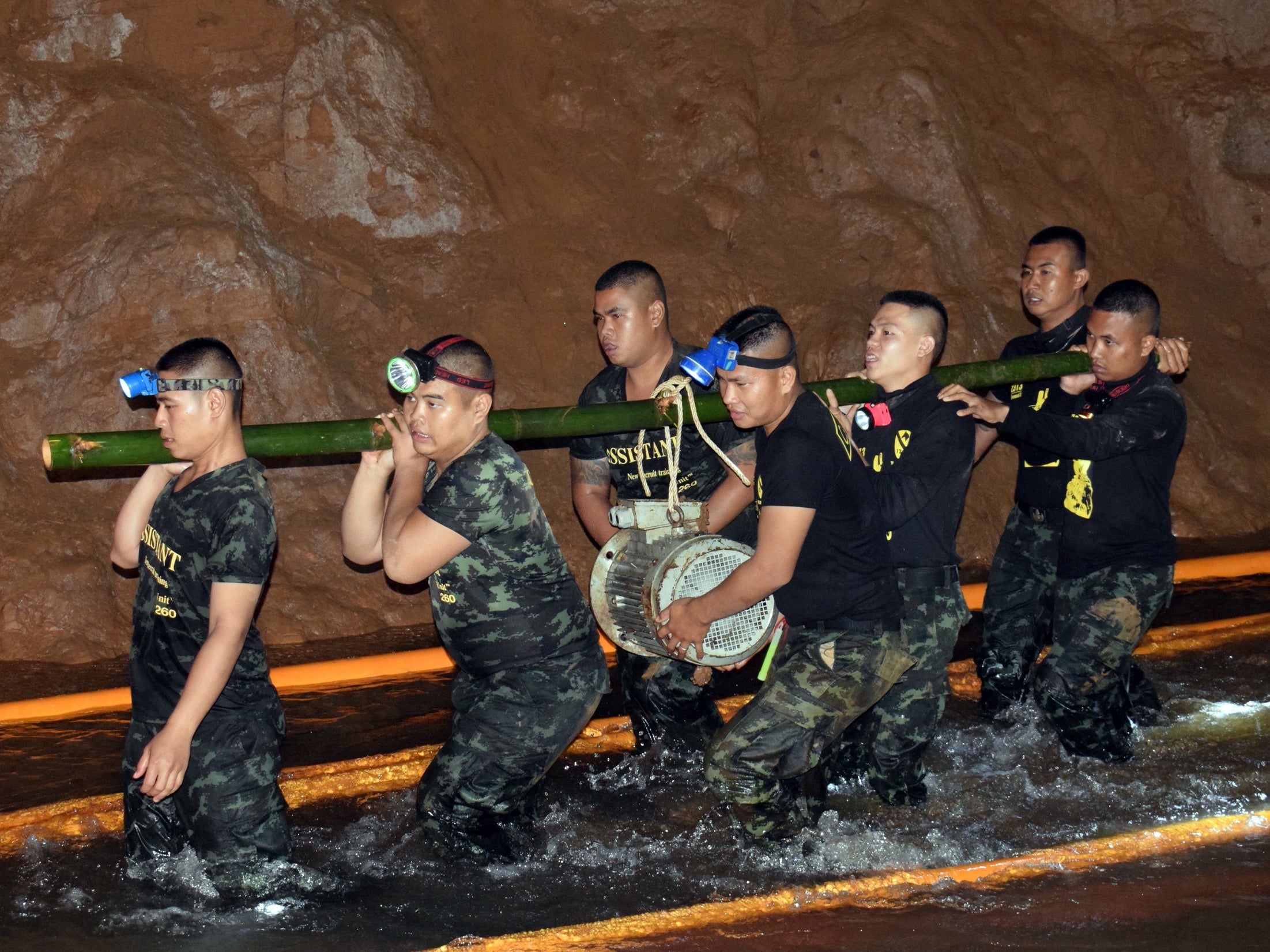 Thai authorities are pumping water from the caves