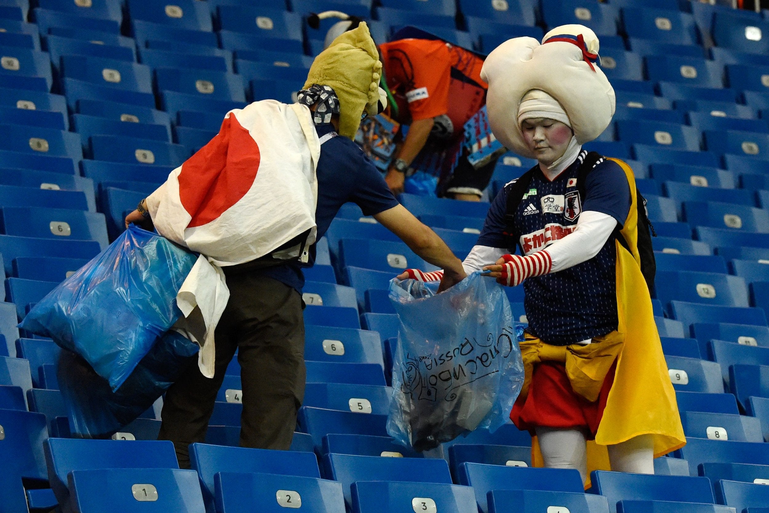 Japanese supporters have cleaned the stadium after each of their games in Russia