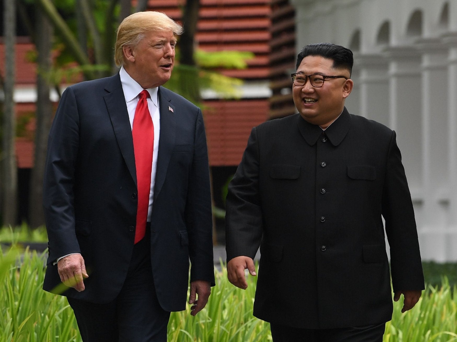 Mr Trump and Kim Jong-un at a historic US-North Korea summit in Singapore in June (AFP/Getty)