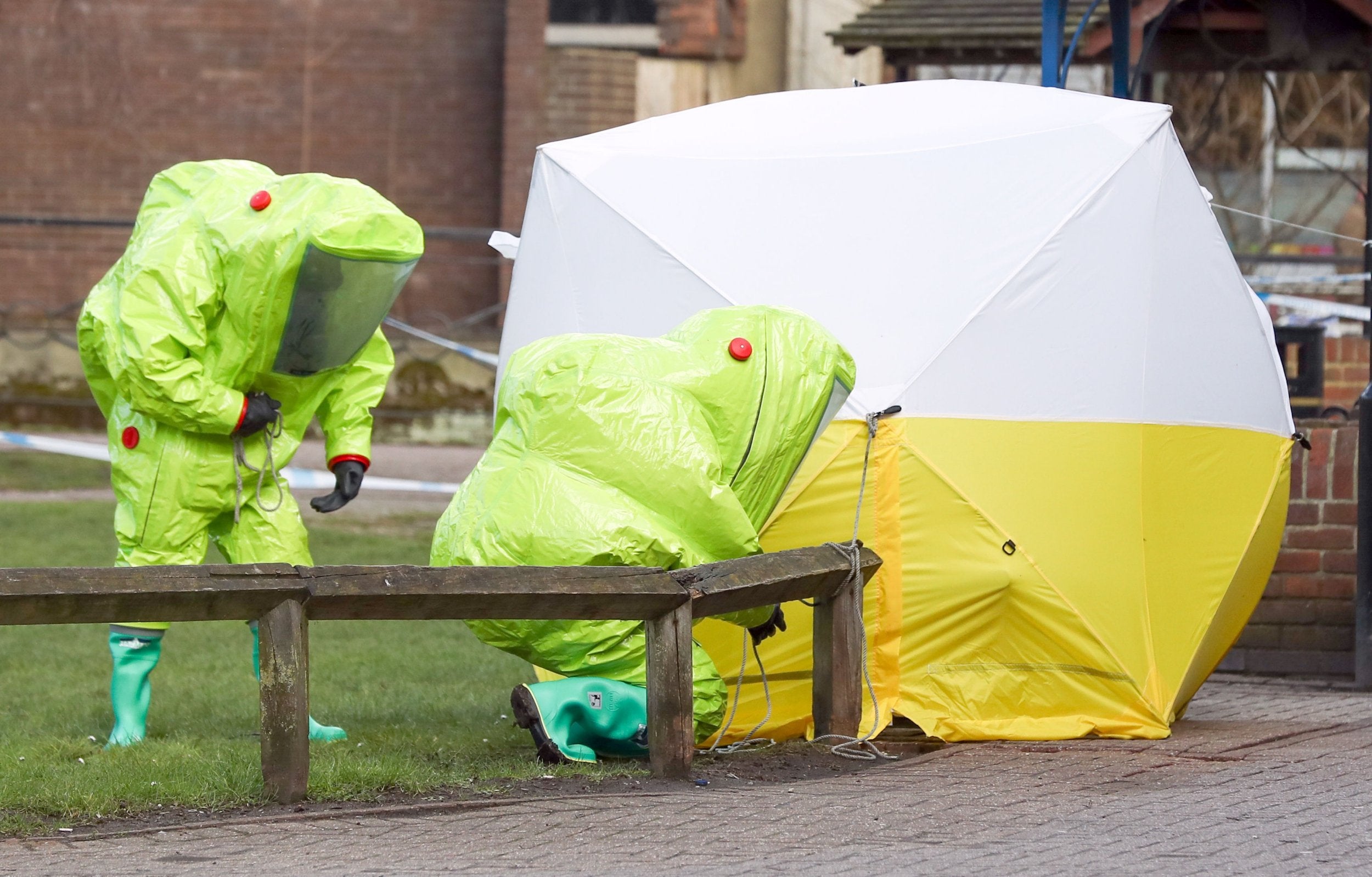 Personnel in hazmat suits investigate the poisoning of Sergei and Yulia Skripal