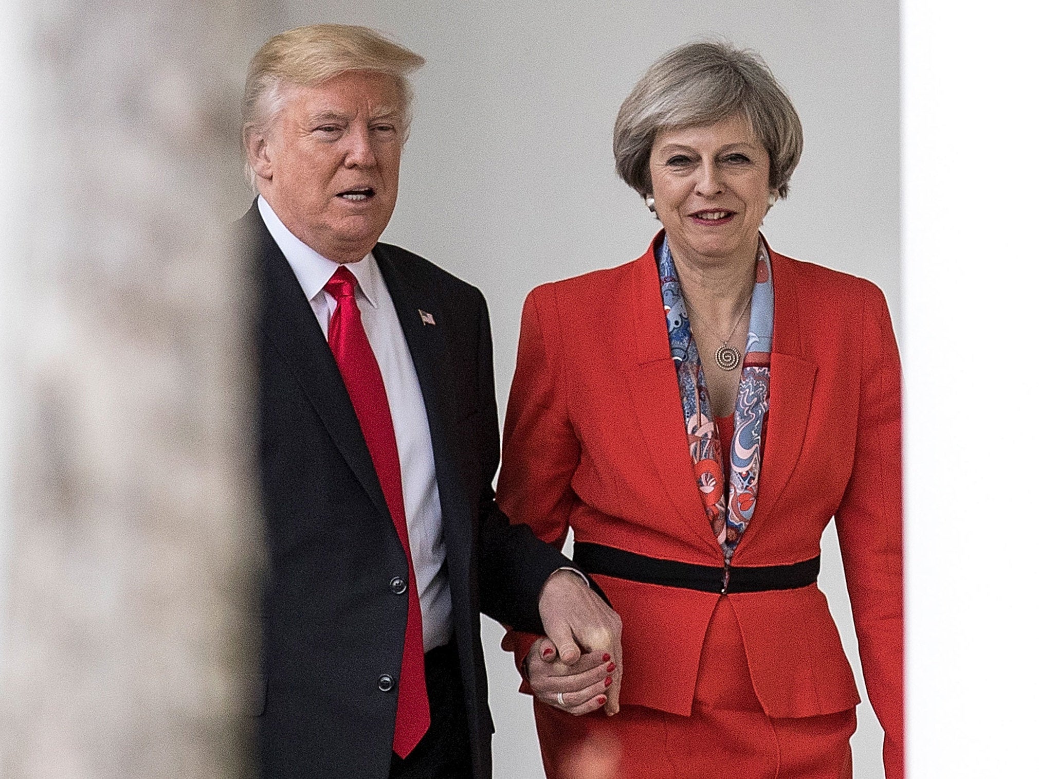 The prime minister was criticised for appearing in public holding hands with Donald Trump when they met last year