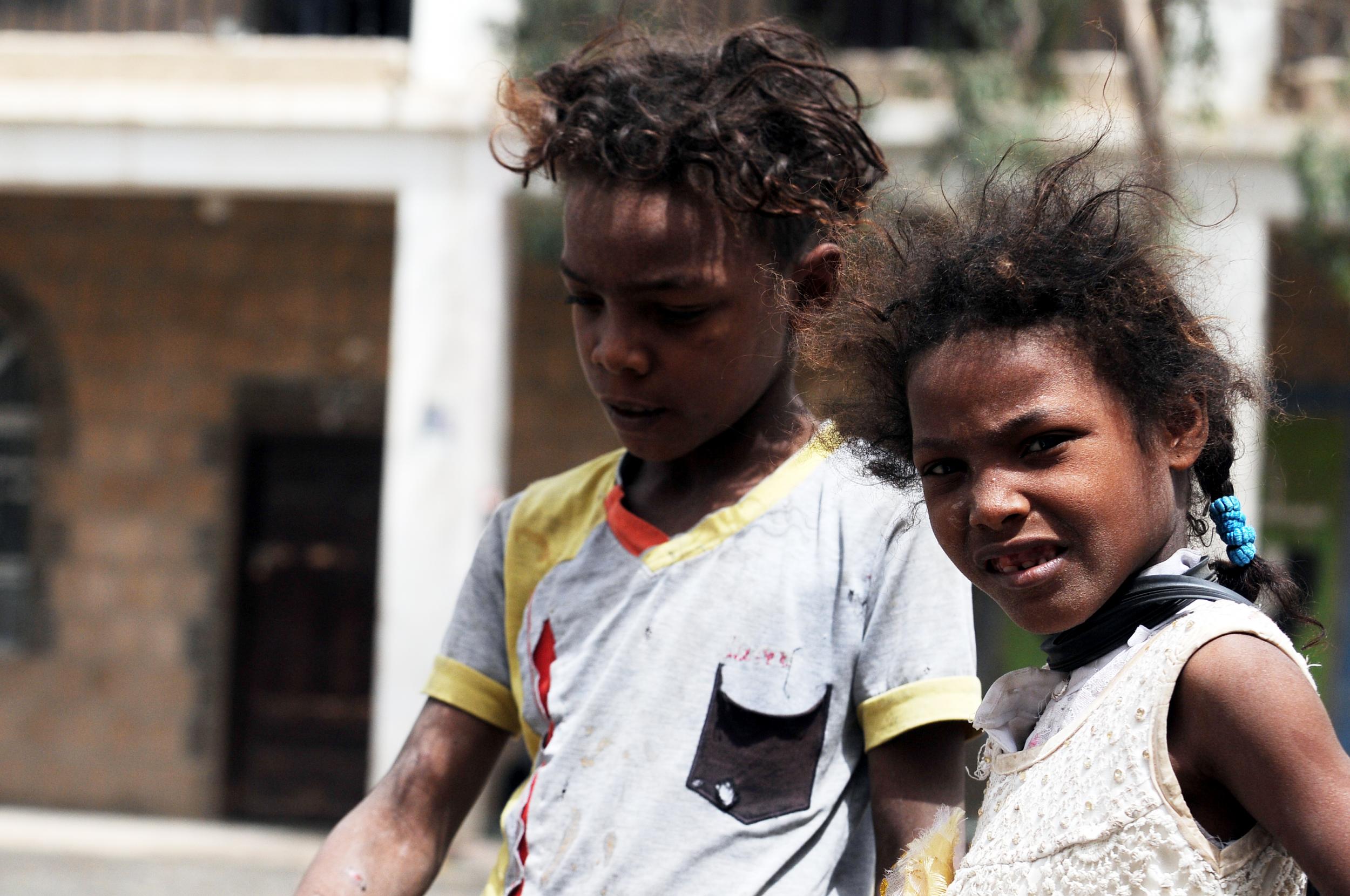 Children who fled the Yemeni city of Hodeidah are seen at a displaced temporary shelter on 1 July 2018