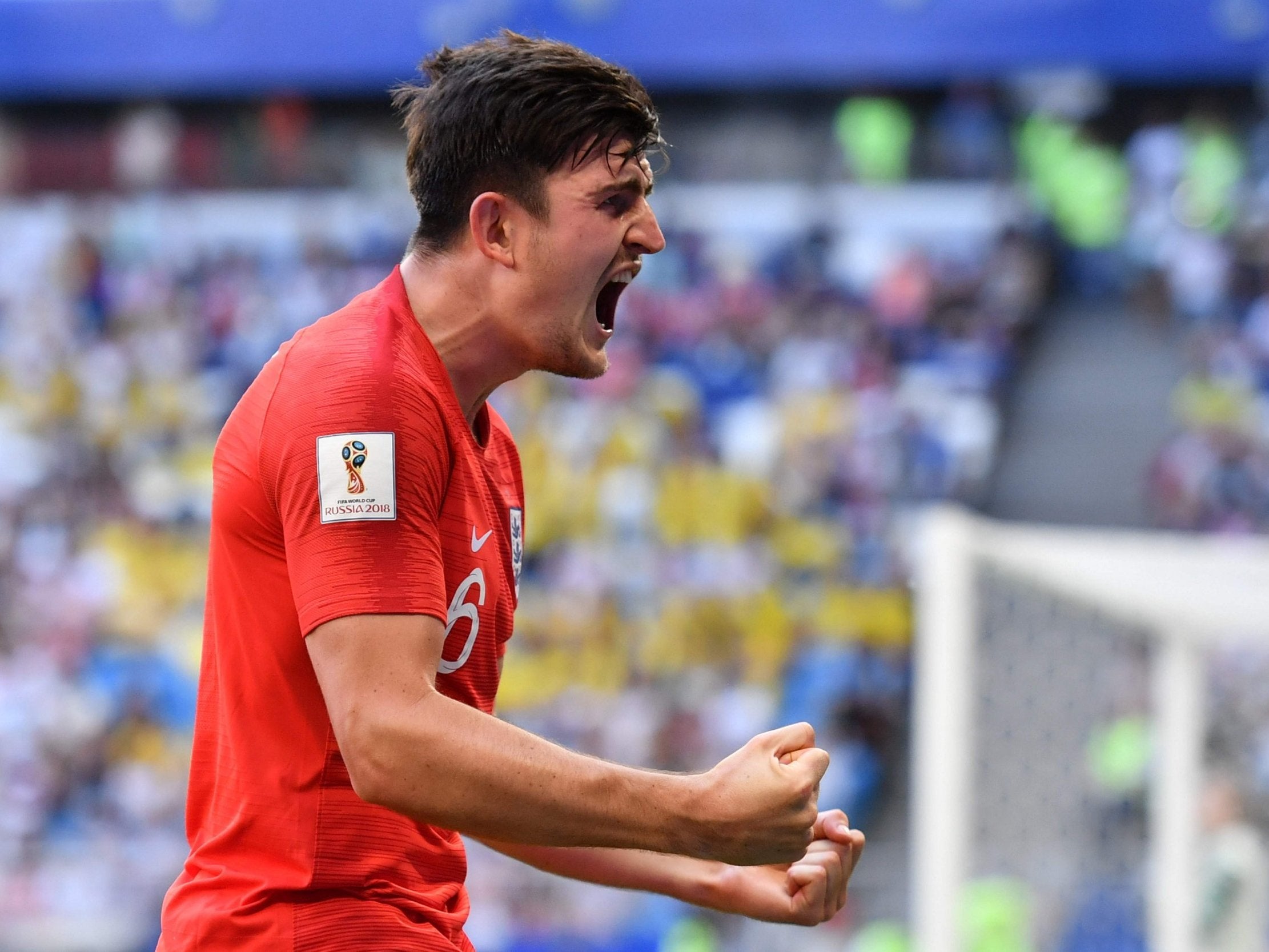 England's defender Harry Maguire celebrates after scoring the opener