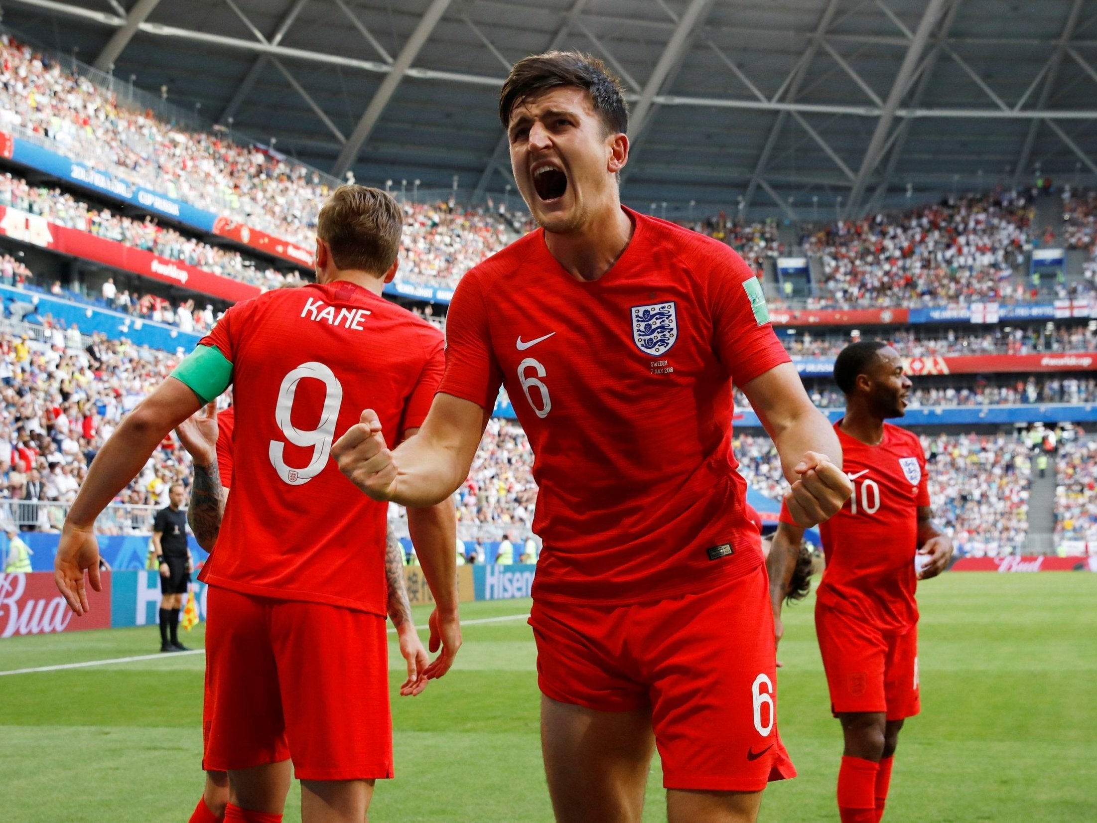 England's Harry Maguire celebrates scoring their first goal