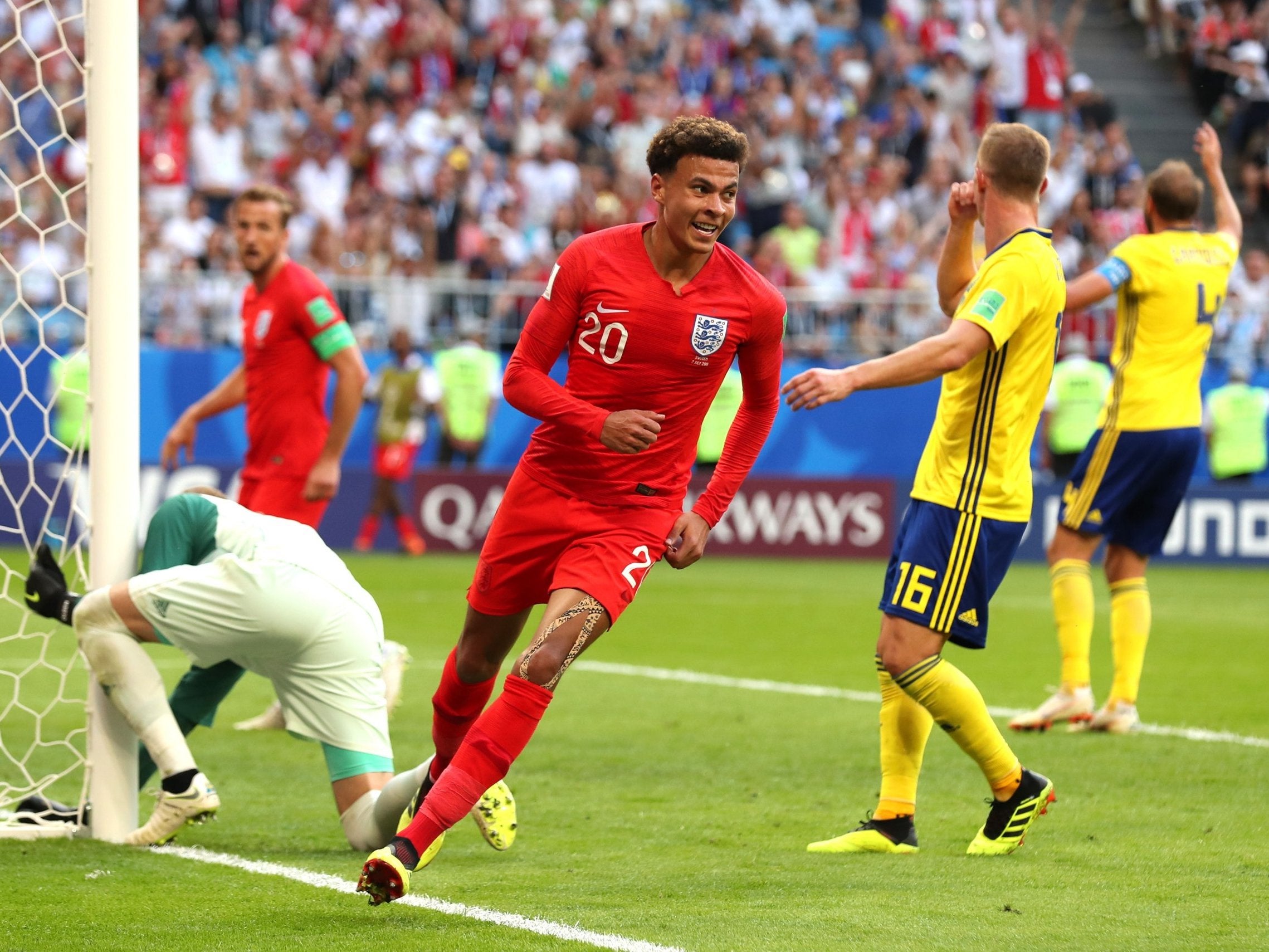 Dele Alli of England celebrates after scoring his team's second goal